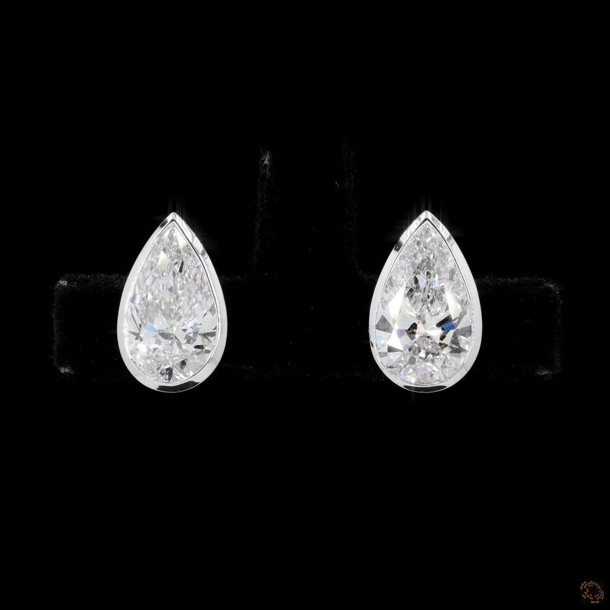 3.04 Ct Bezel-Set Pear Cut Diamond Stud Earrings in White Gold