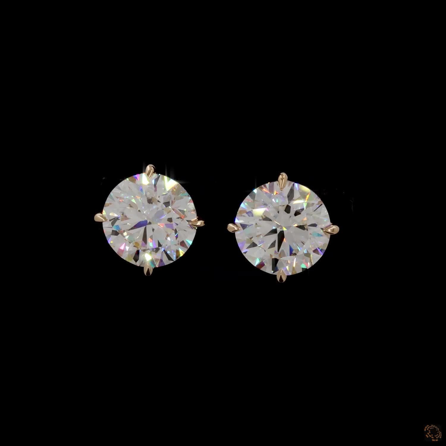 12.14 Ct High-clarity Round Brilliant Cut diamonds showing intense fire and brilliance