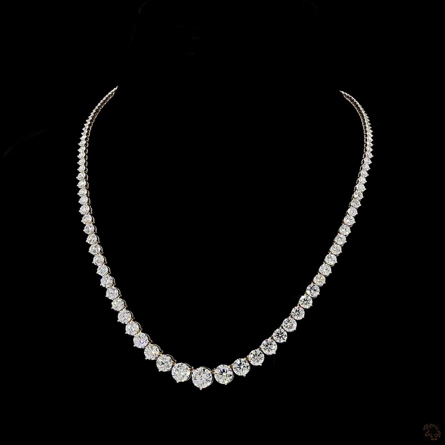 17.79 Ct Round Brilliant Cut diamonds arranged in a dramatic graduated layout tapering toward the back
