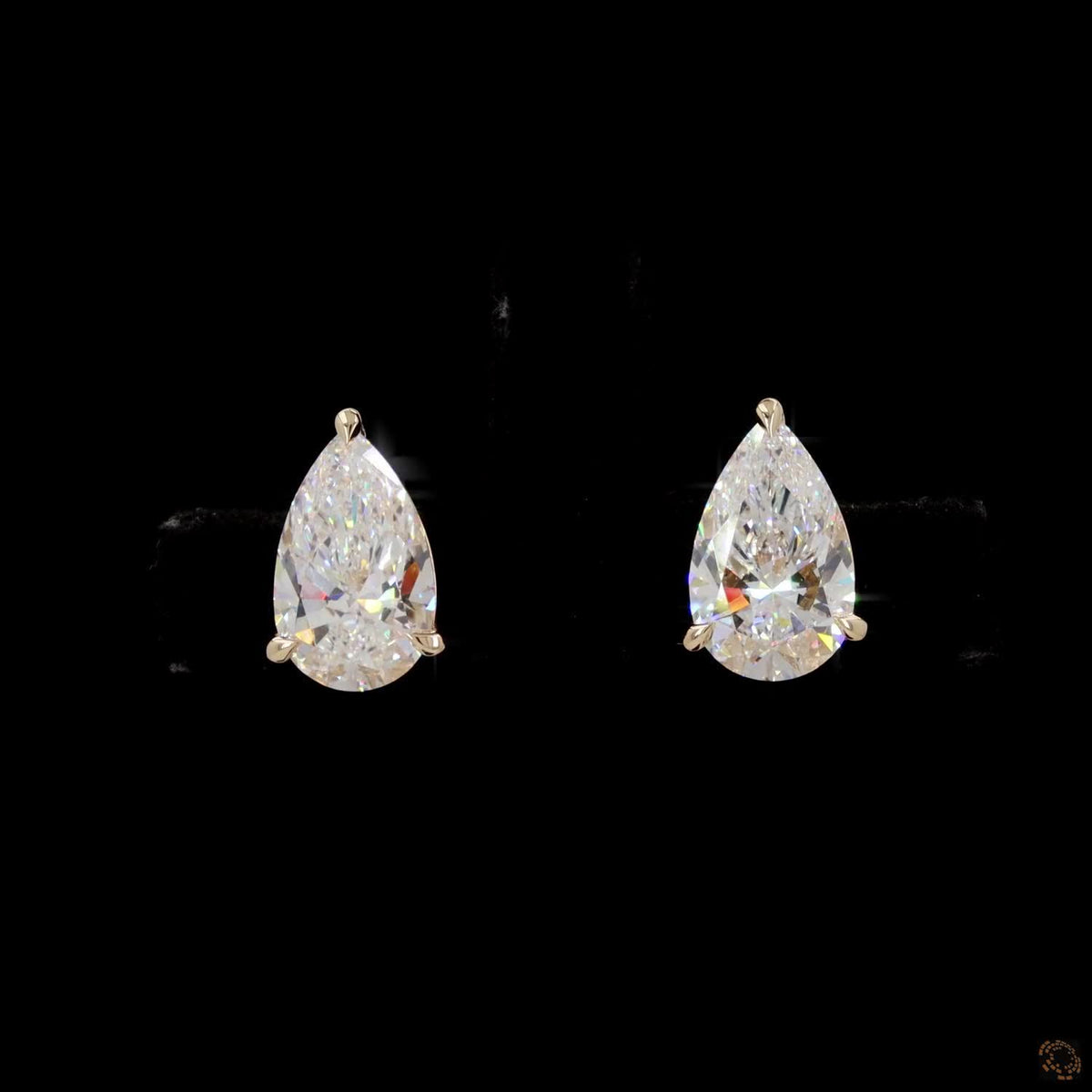 3.01 Ct Three-Prong Pear Cut Diamond Stud Earrings in Yellow Gold