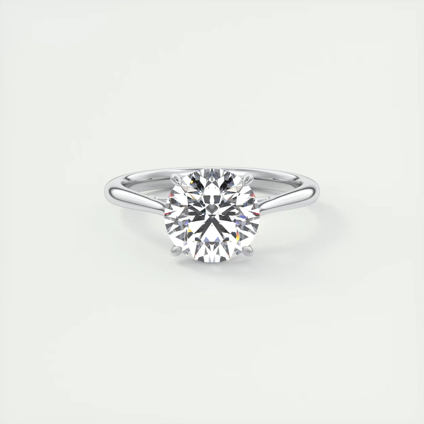 4-5 GM Round Solitaire with Four Eagle Claws Set Engagement Rings