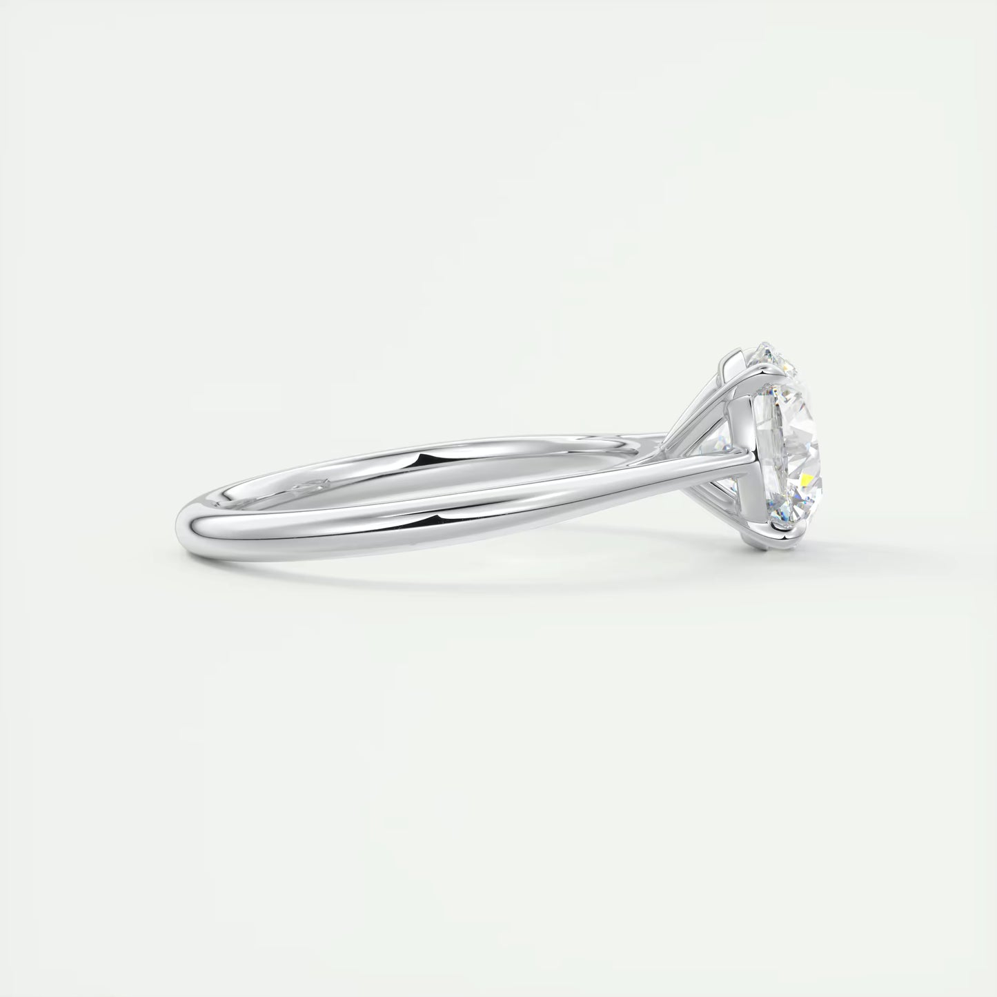 4-5 GM Round Solitaire with Four Eagle Claws Set Engagement Rings