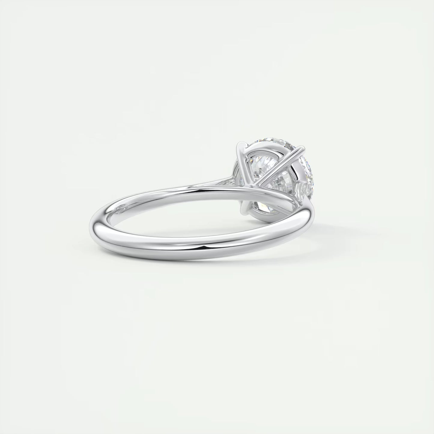 4-5 GM Round Solitaire with Four Eagle Claws Set Engagement Rings