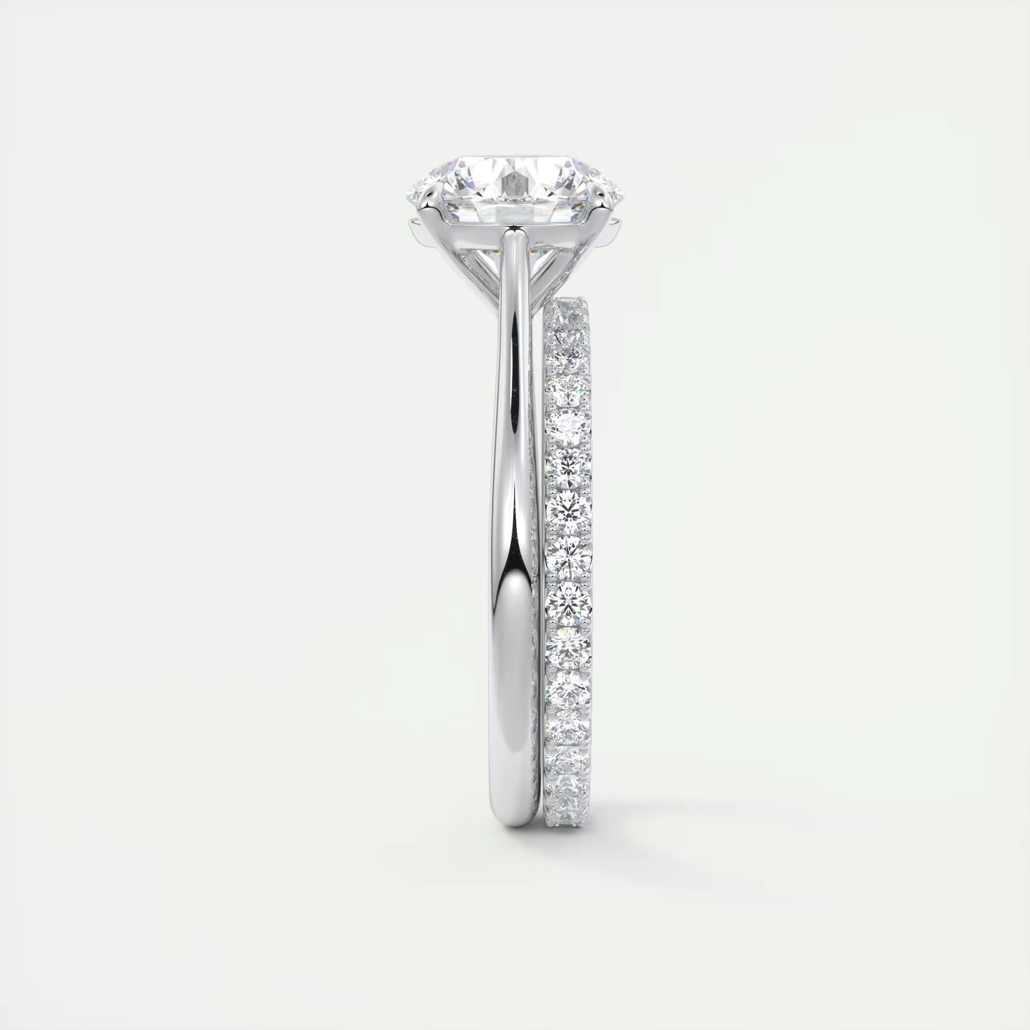 4-5 GM Round Solitaire with Four Eagle Claws Set Engagement Rings
