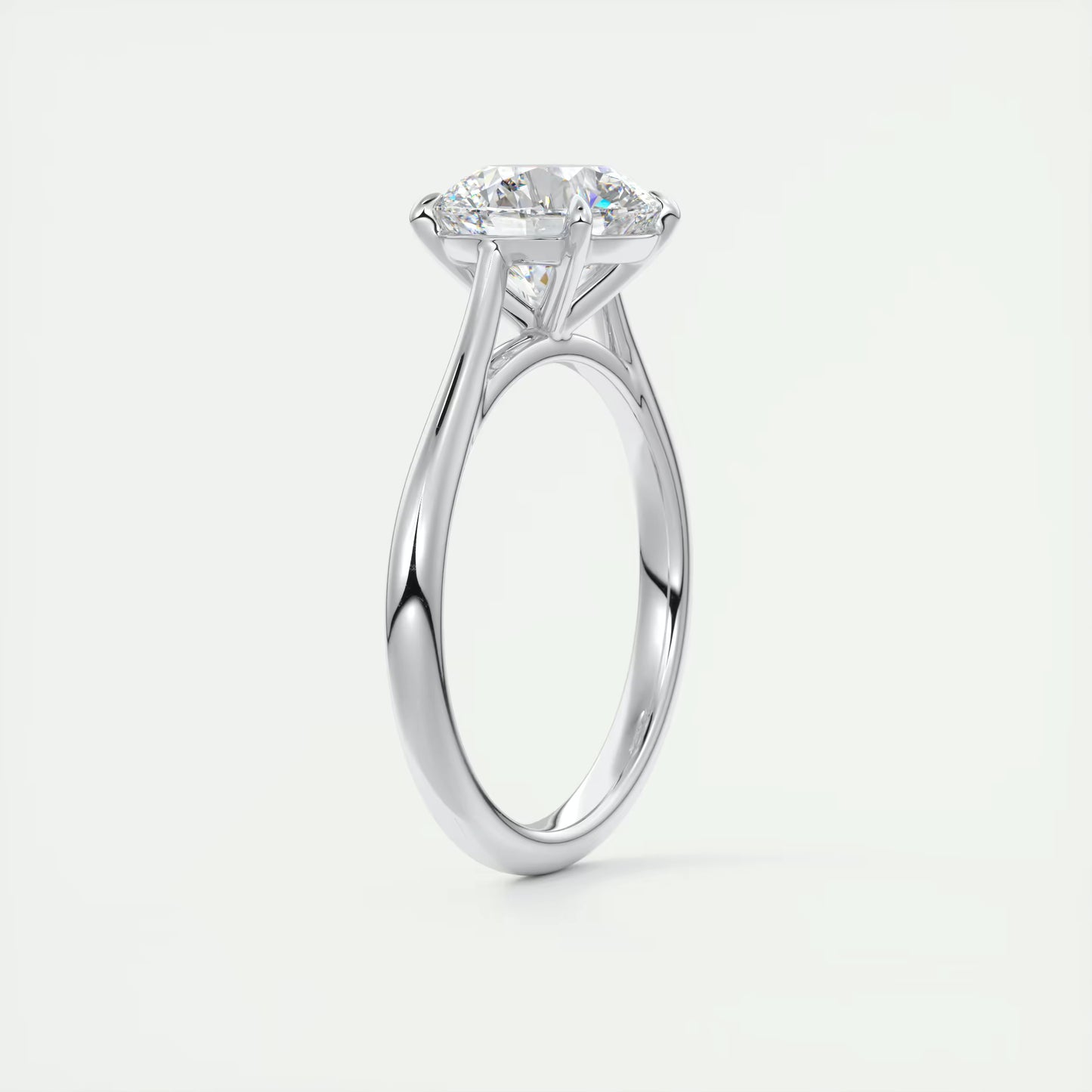 4-5 GM Round Solitaire with Four Eagle Claws Set Engagement Rings