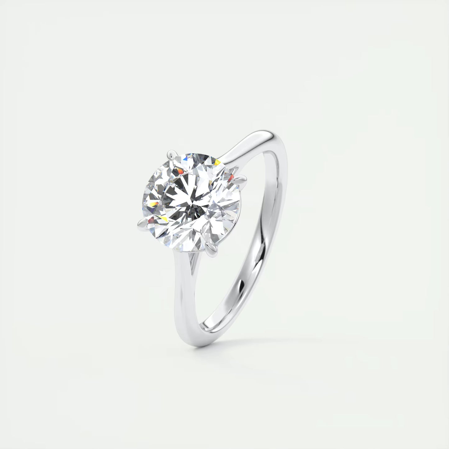 4-5 GM Round Solitaire with Four Eagle Claws Set Engagement Rings