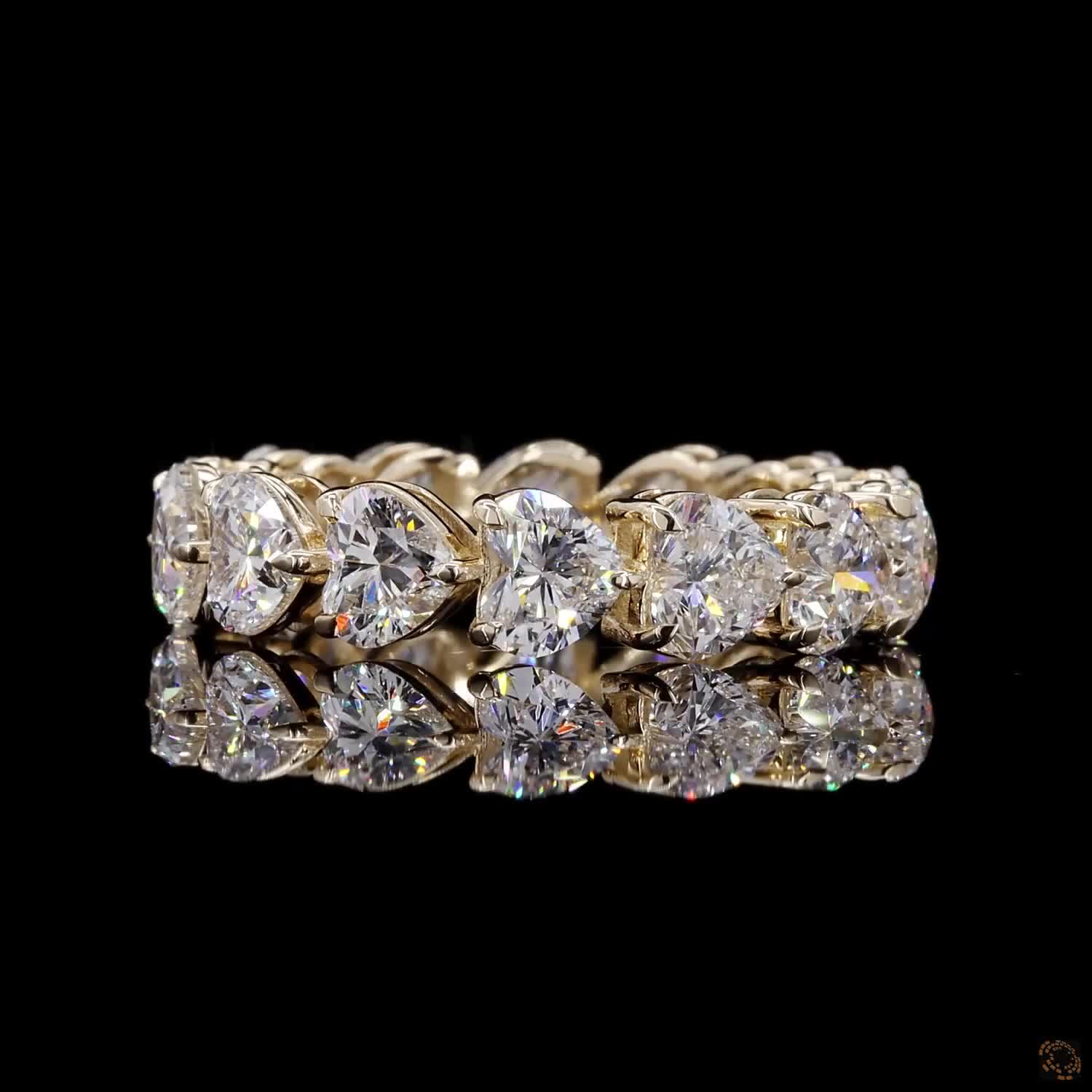 5.44 Ct Full eternity band featuring a continuous row of horizontally aligned east-west oriented heart-cut diamonds seamless set end-to-end around the entire band