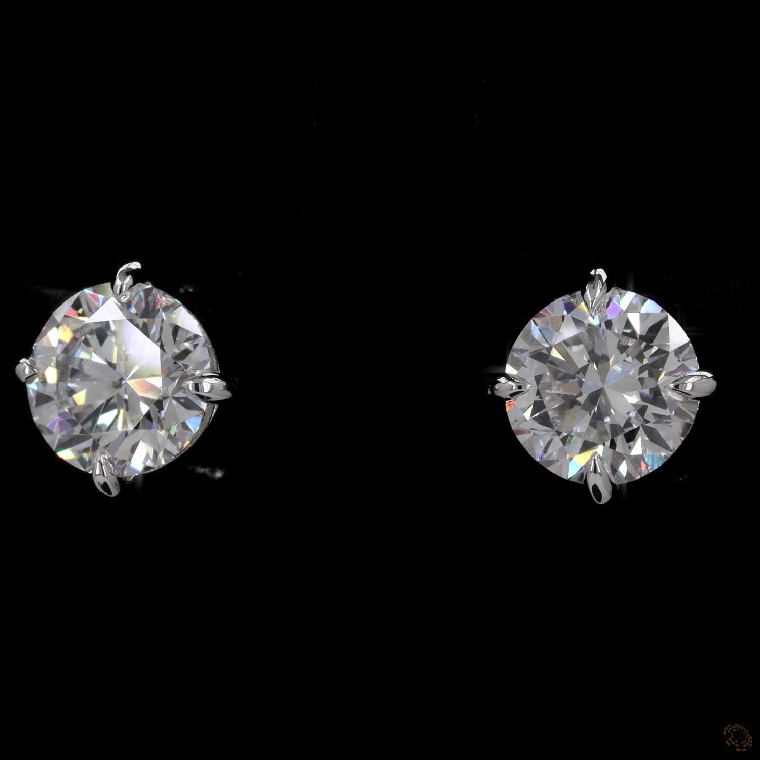 2.14 Ct The shiny white gold bezel creates an illusion of a larger diamond diameter by extending the bright, reflective border outward