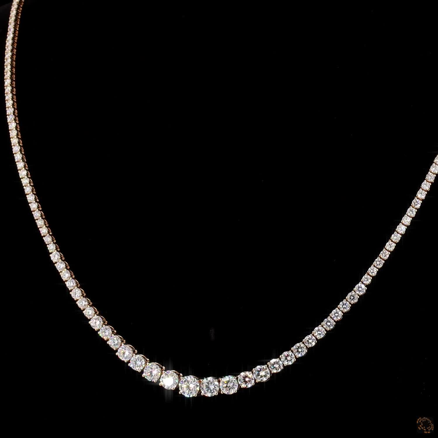 9.7 Ct Riviera-style tennis necklace featuring a smooth, symmetrical graduation of round brilliant diamonds leading to a central focal point