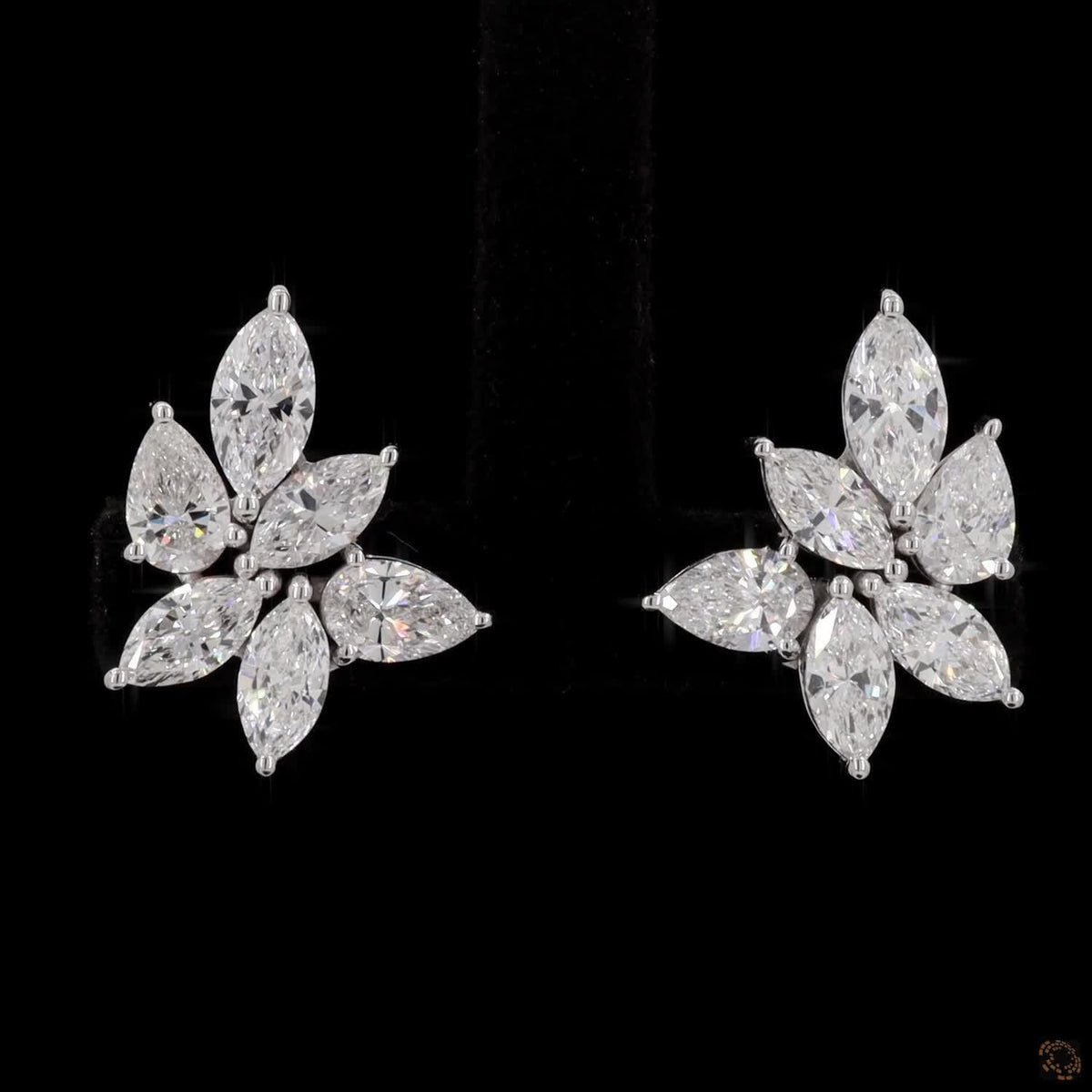 2.85 Ct High-brilliance marquise and pear cut diamonds set in shared-prong mountings