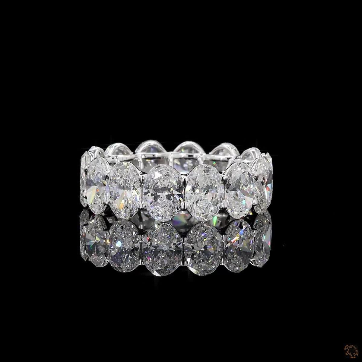 7.24 Ct Oval Cut Diamond Eternity Band set in white gold with vertically aligned oval stones