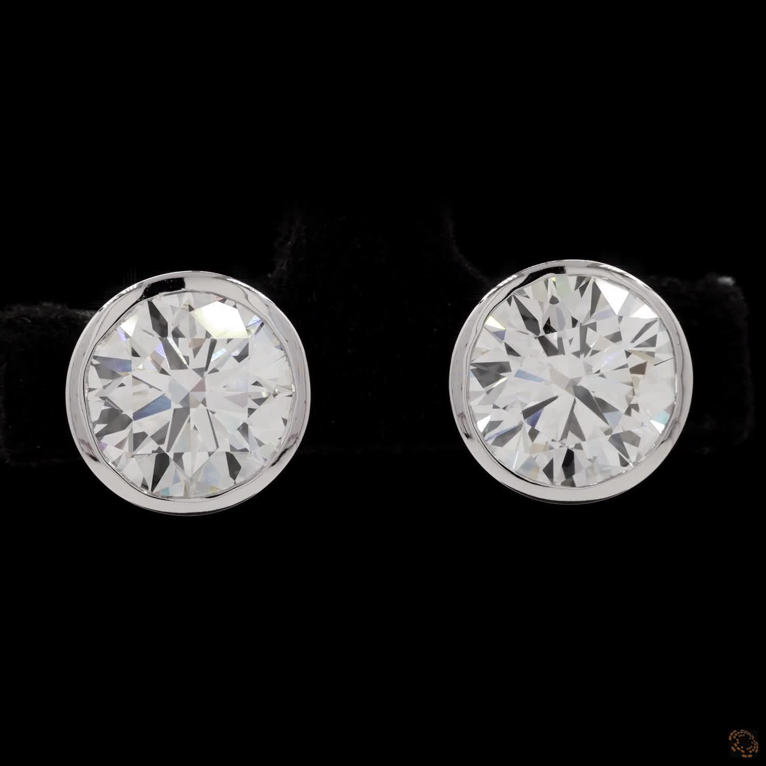 5.08 Modern Bezel-Set Oval Diamond Studs in Platinum / White Gold