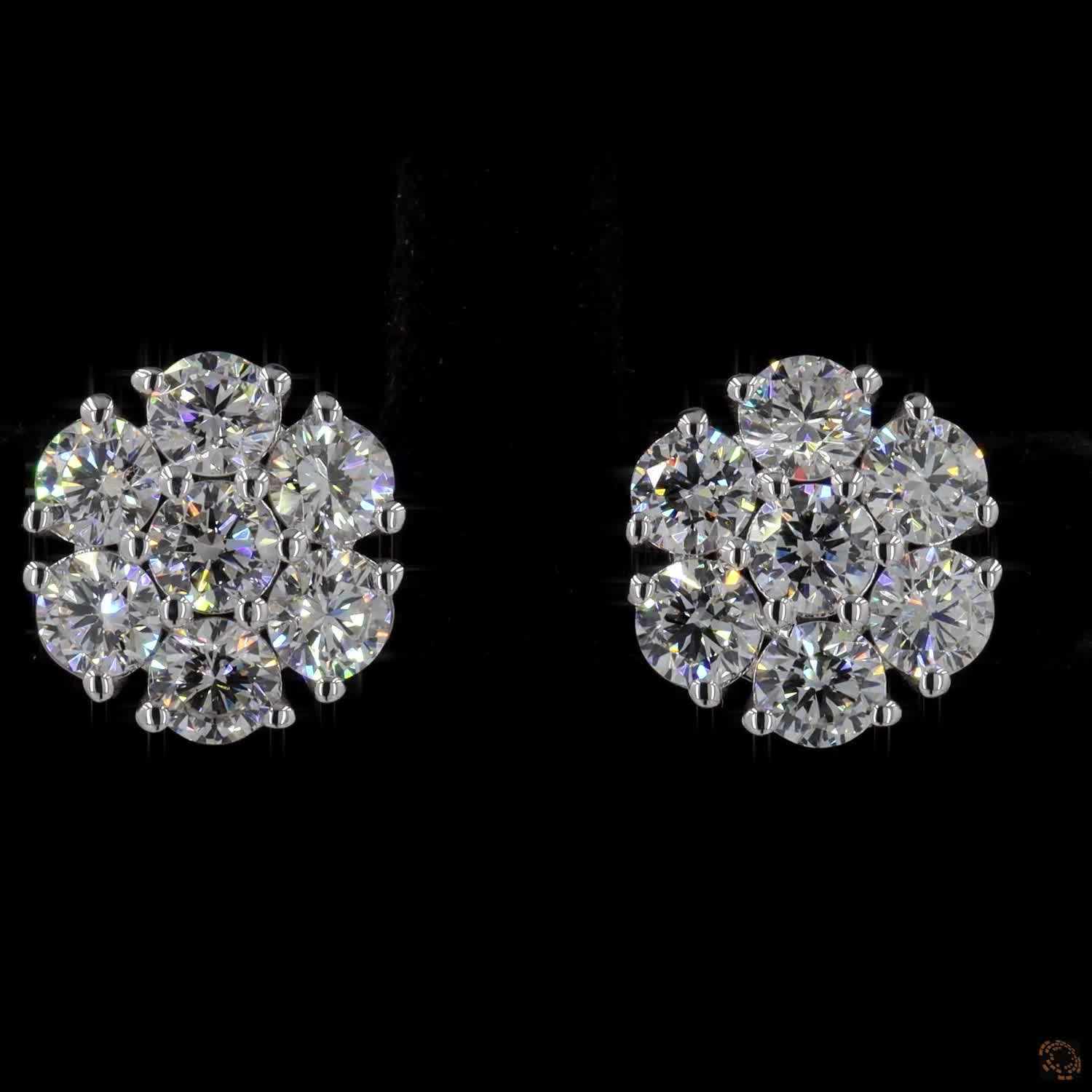 2.2 Ct Round Brilliant Cut Central diamond framed by a floral halo of round diamonds