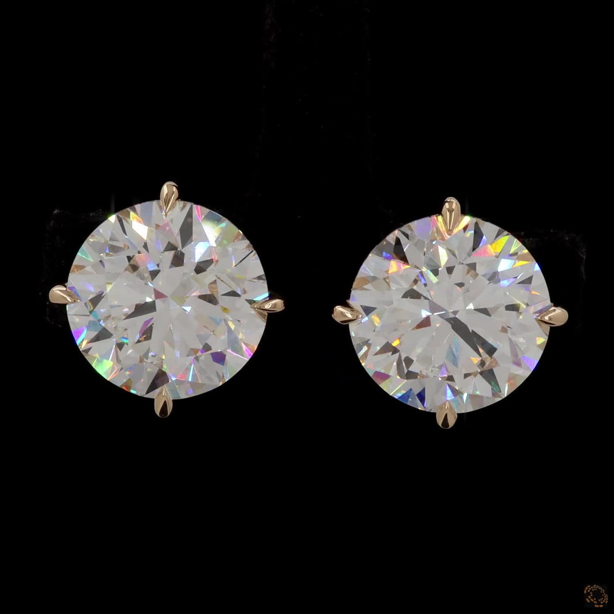 12.14 Ct High-clarity Round Brilliant Cut diamonds showing intense fire and brilliance