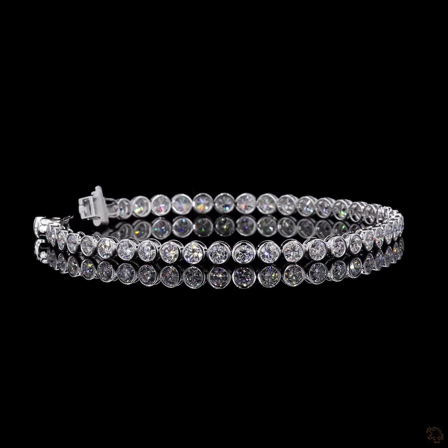 5.57 Ct Full Bezel Setting Individual smooth round metal rims completely encircling each diamond