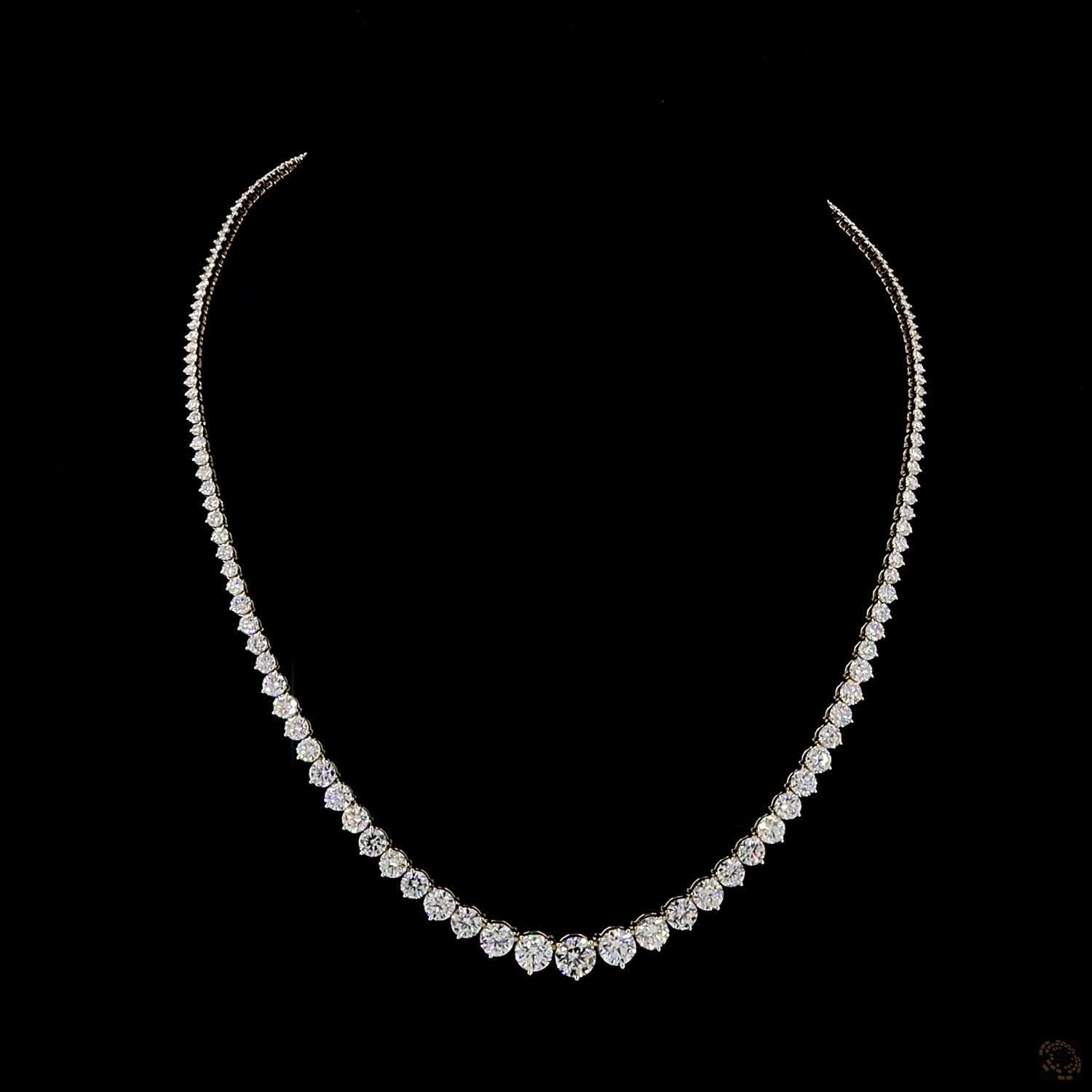 29.06 Ct Round Brilliant Cut diamonds seamlessly graduated from larger center stones down to smaller accent diamonds toward the back