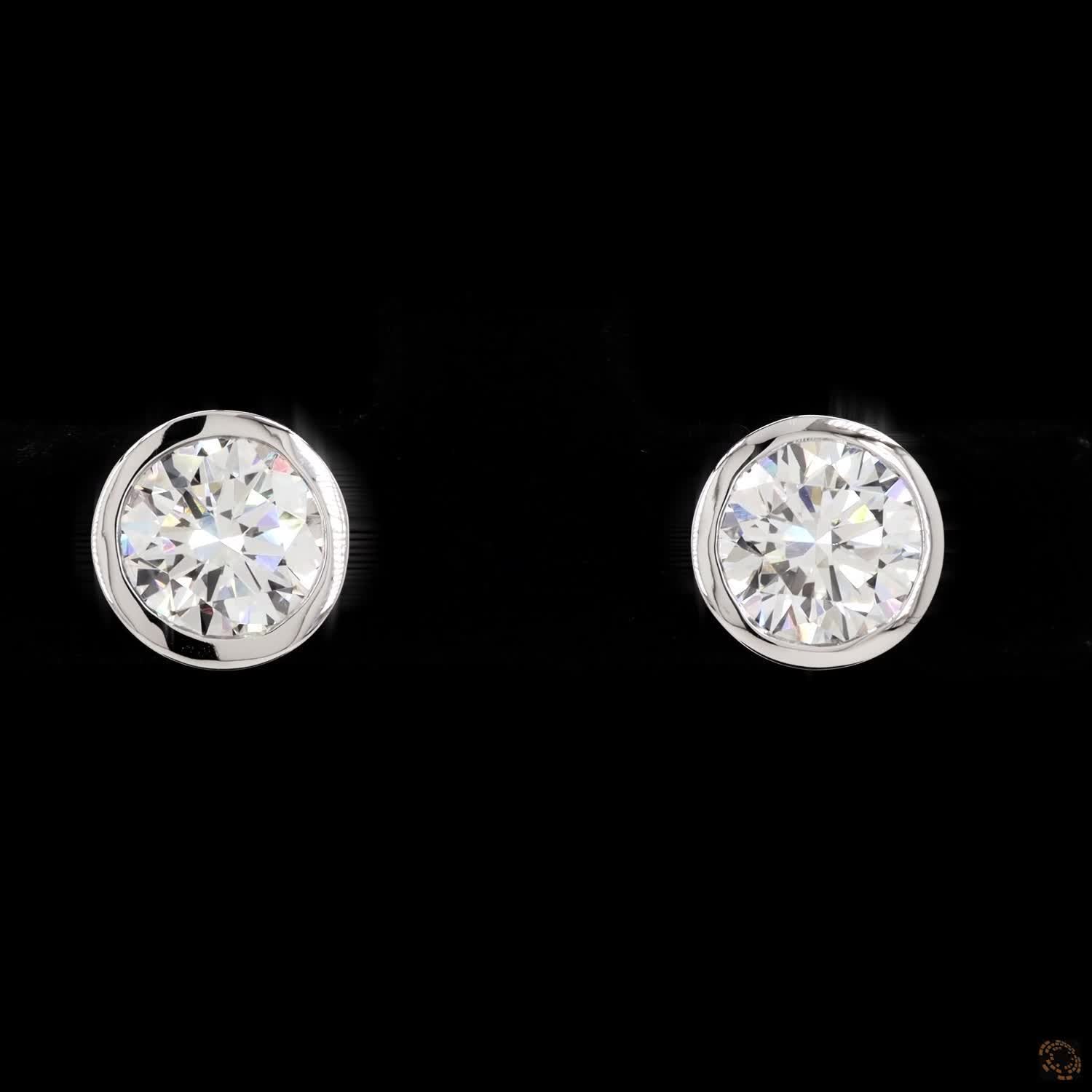 1.45 Bezel-Set Oval Diamond Stud Earrings in White Gold / Platinum
