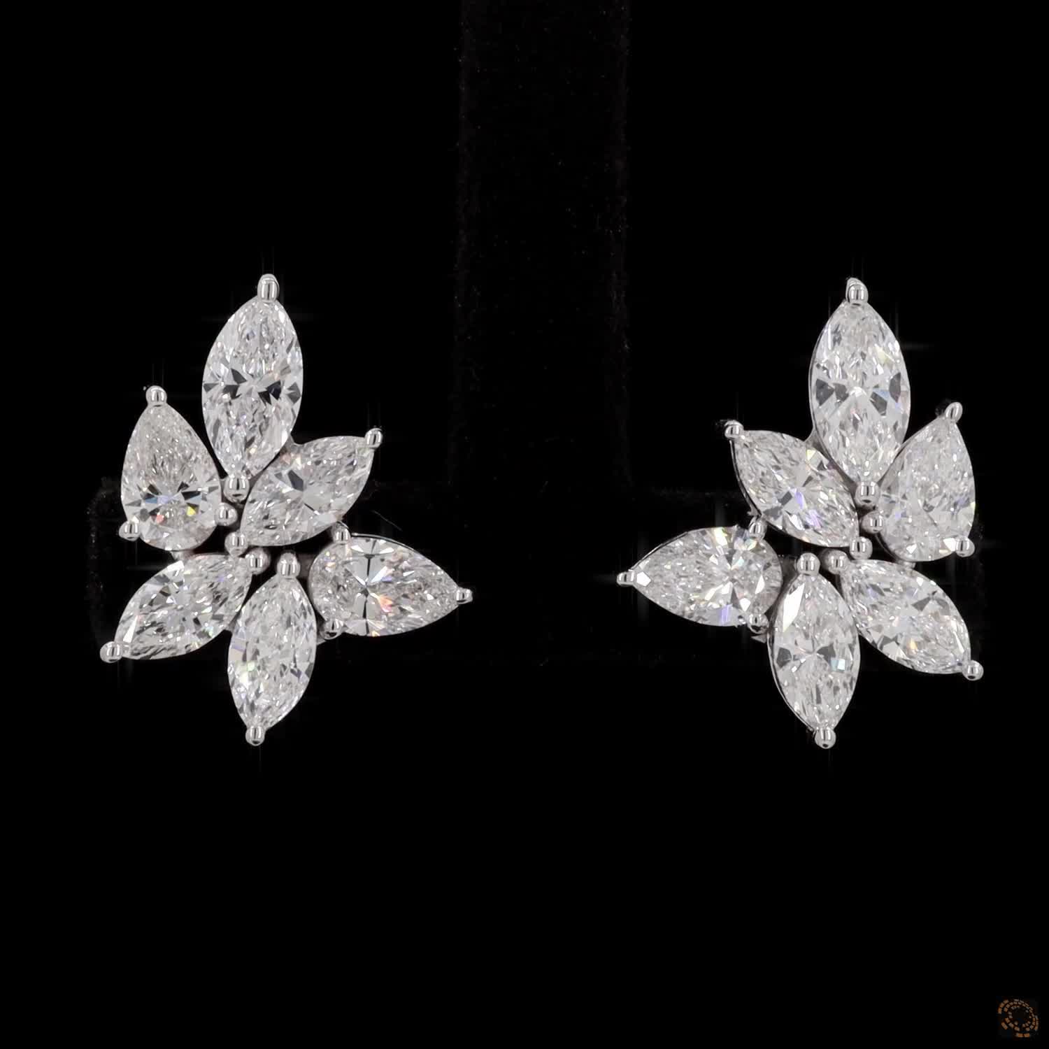 2.85 Ct High-brilliance marquise and pear cut diamonds set in shared-prong mountings