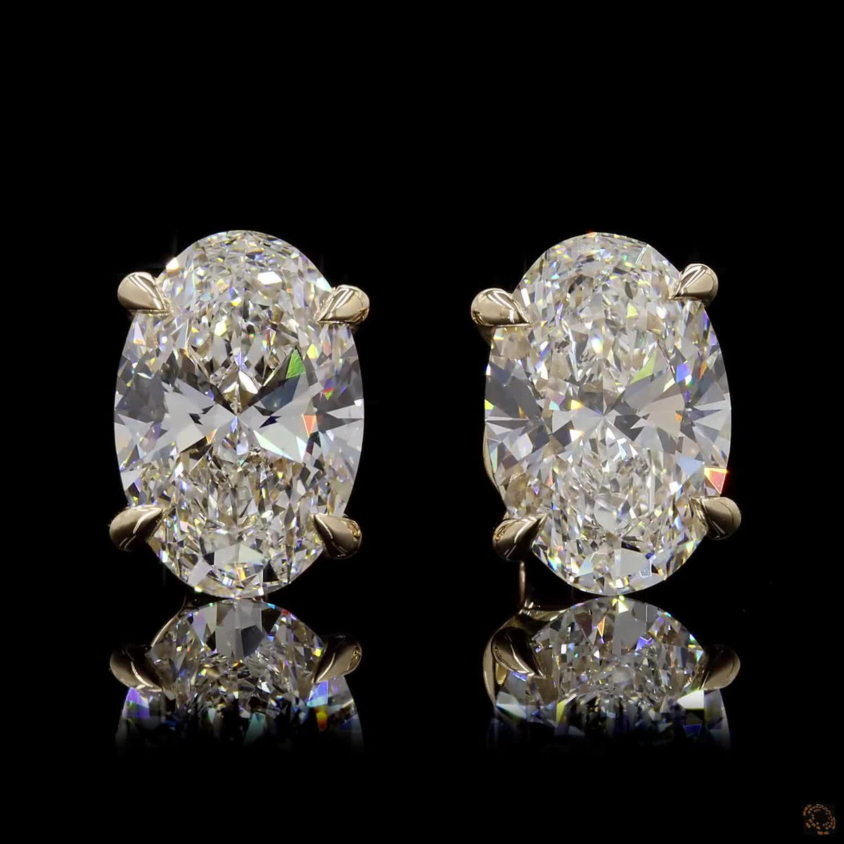 4.16 Ct Four-Prong Oval Cut Diamond Stud Earrings in Yellow Gold