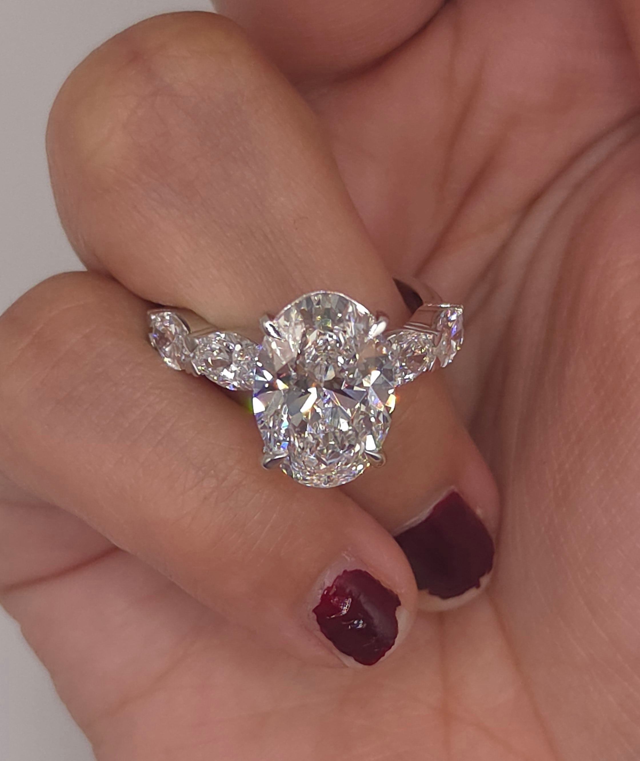 6.64 Ct The Grand Oval: Oval Cut Lab-Grown Diamond Ring with Graduated Oval Accent Shank
