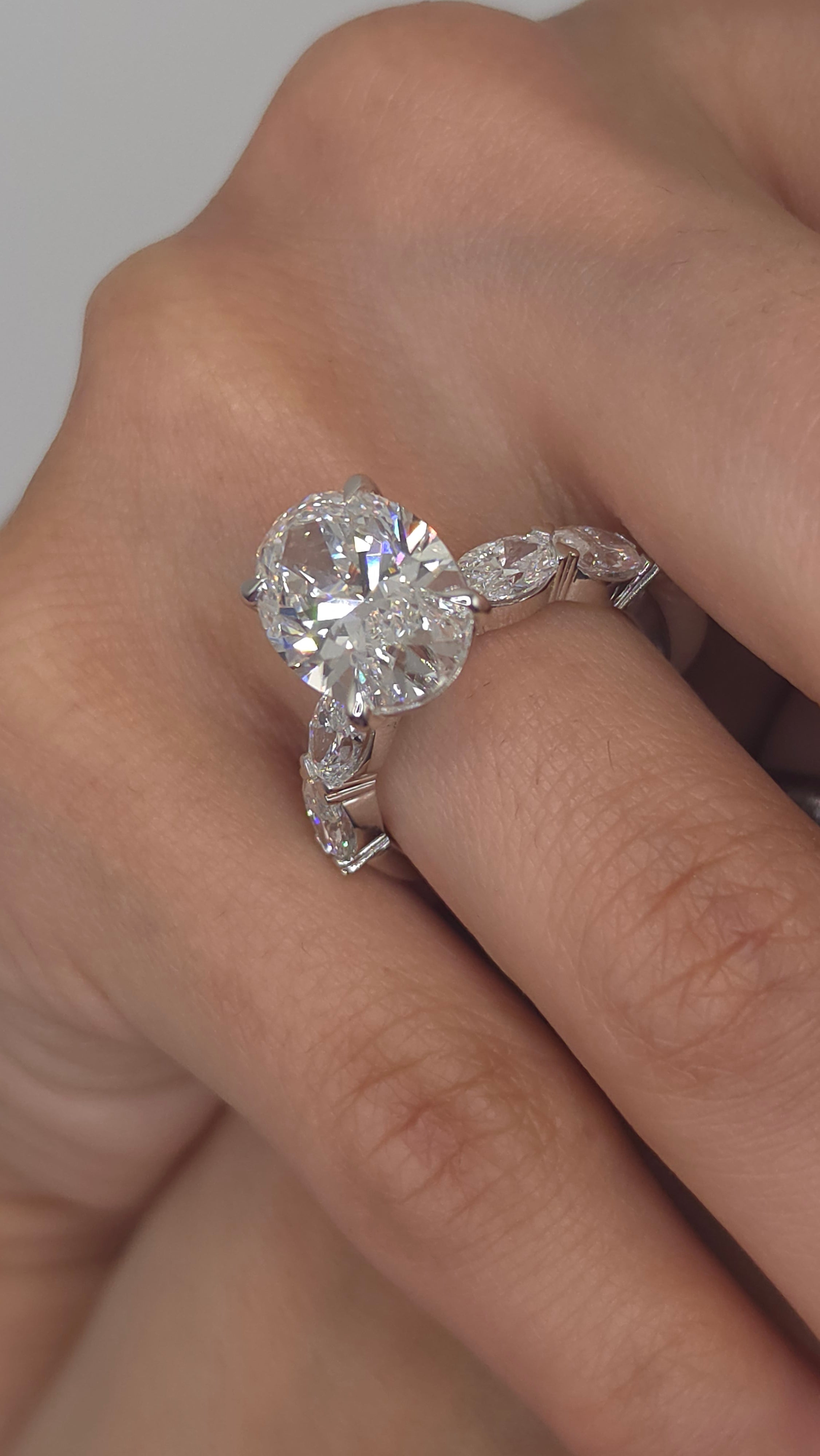 6.64 Ct The Grand Oval: Oval Cut Lab-Grown Diamond Ring with Graduated Oval Accent Shank