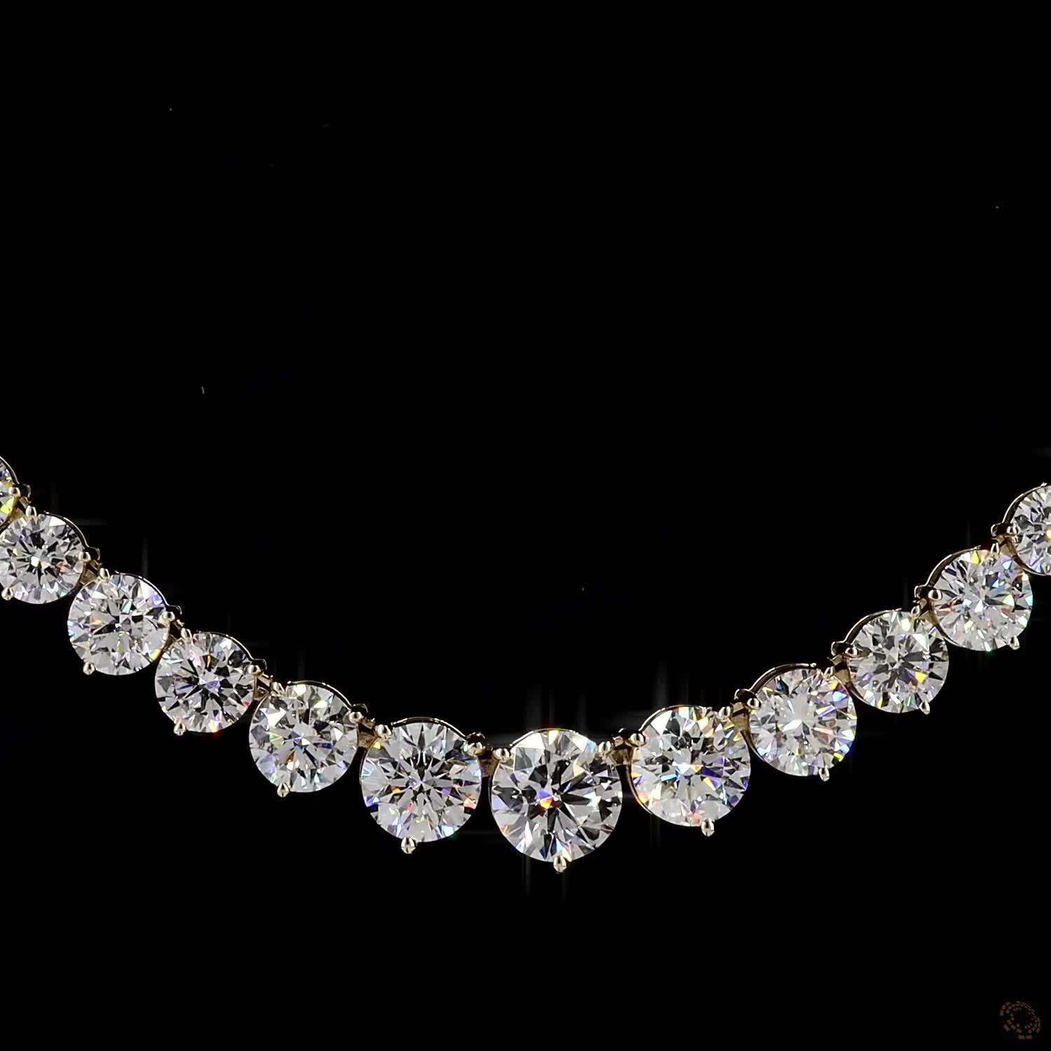 29.06 Ct Round Brilliant Cut diamonds seamlessly graduated from larger center stones down to smaller accent diamonds toward the back