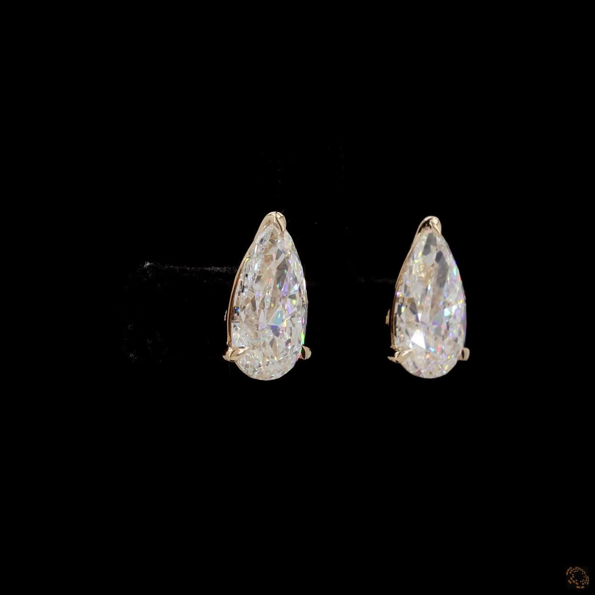 4.00 Ct Three-Prong Pear Cut Diamond Stud Earrings in Yellow Gold