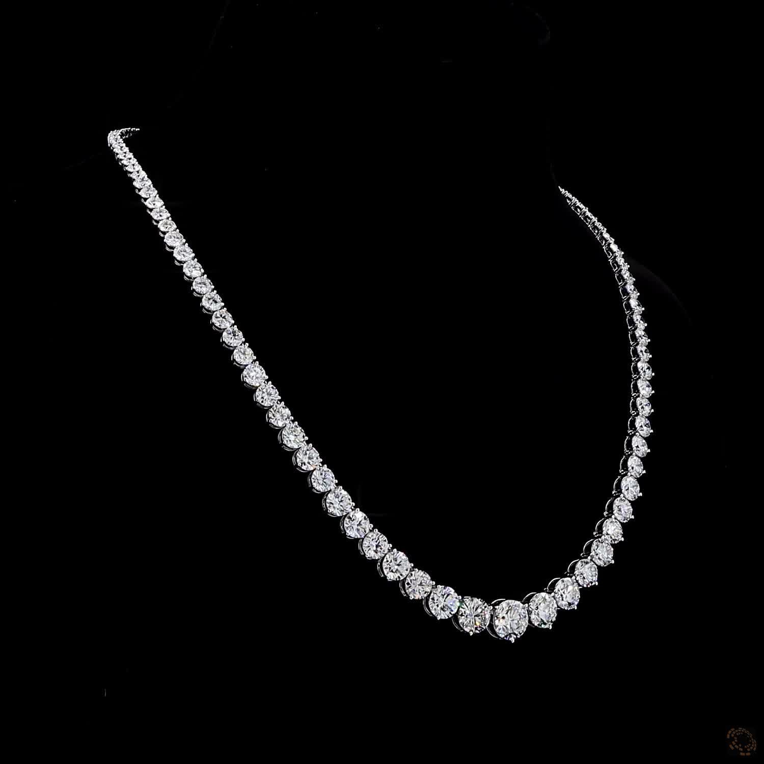 38.58 Ct Experience sleek, dynamic luxury with this bezel-set graduated round-cut diamond tennis necklace