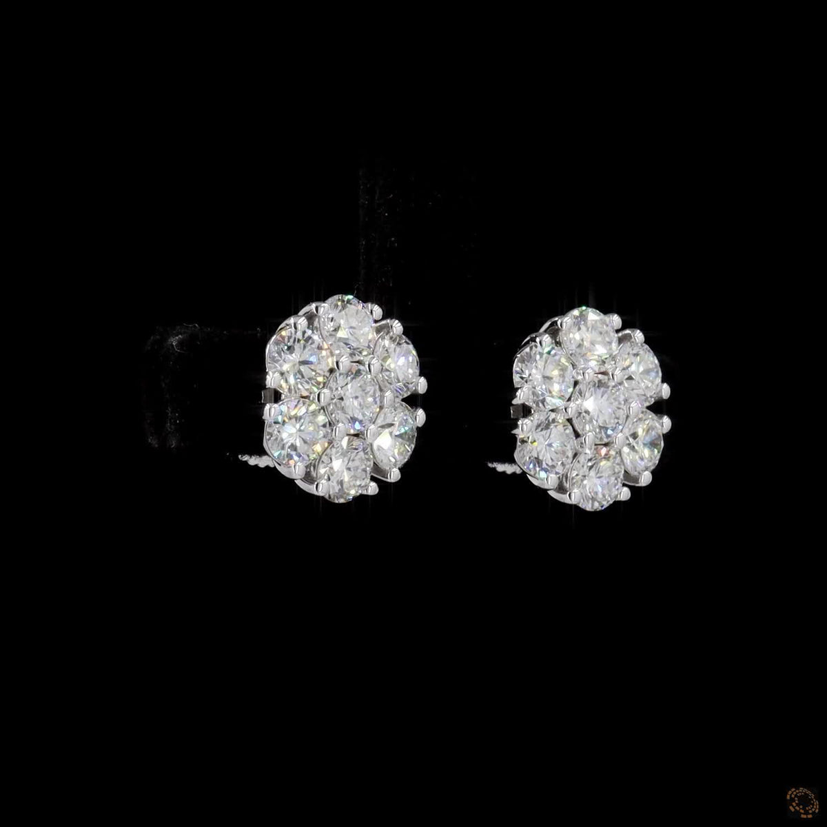 2.2 Ct Round Brilliant Cut Central diamond framed by a floral halo of round diamonds