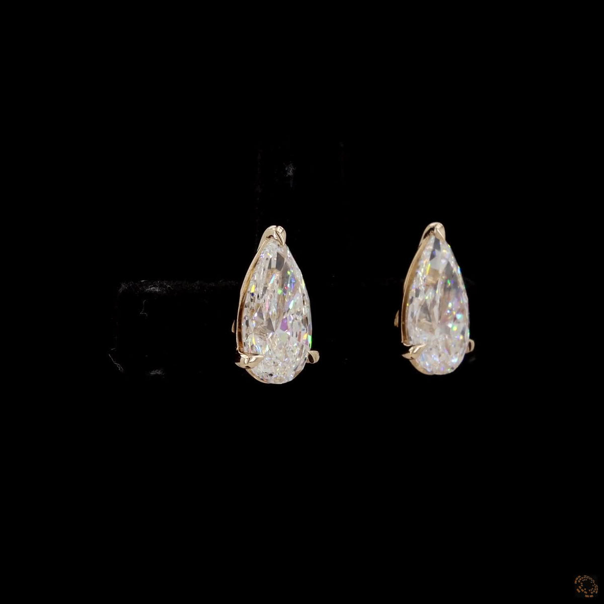 3.01 Ct Three-Prong Pear Cut Diamond Stud Earrings in Yellow Gold