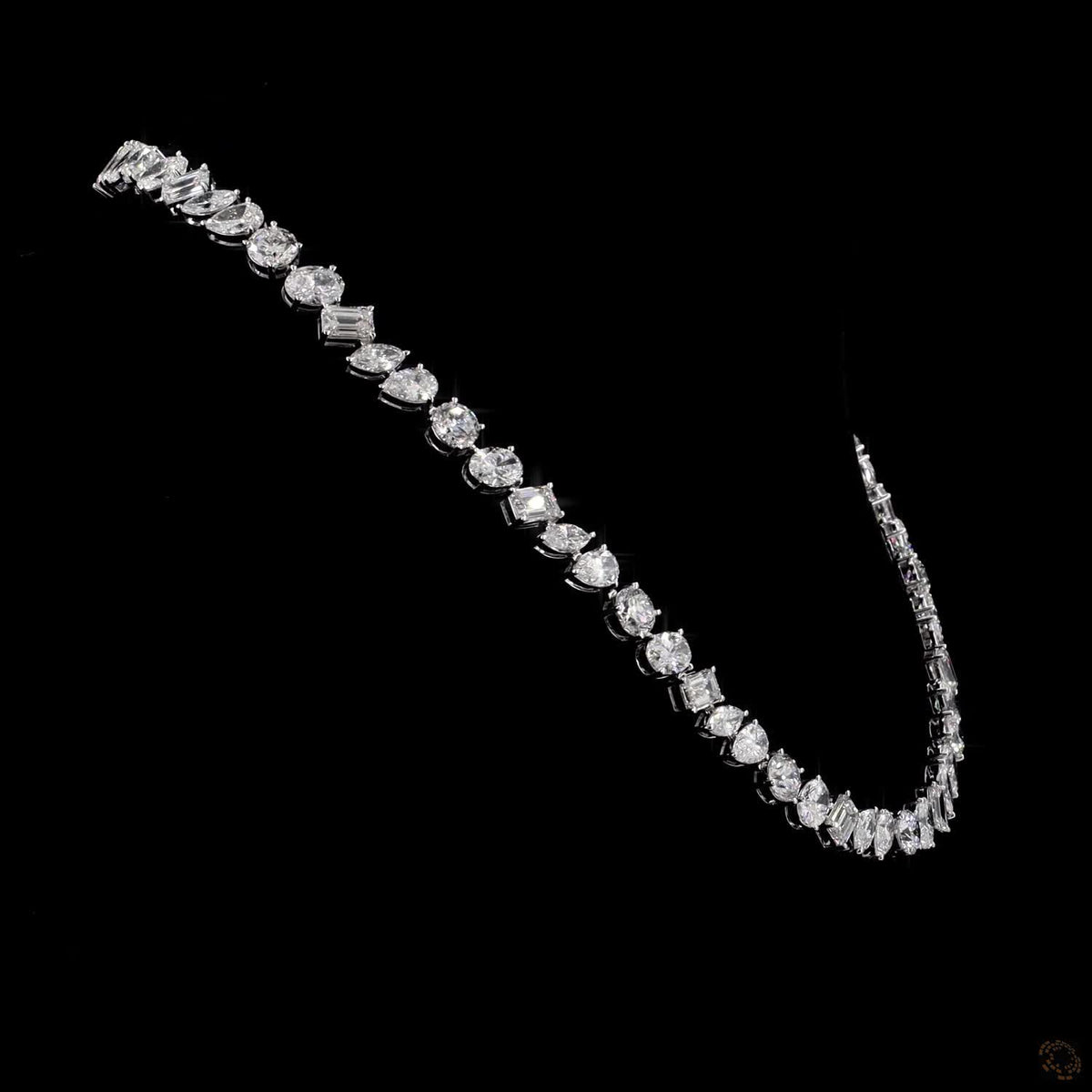 40.61 Ct High-clarity multi-shape diamonds, including round brilliant, oval, emerald, marquise, and pear cuts