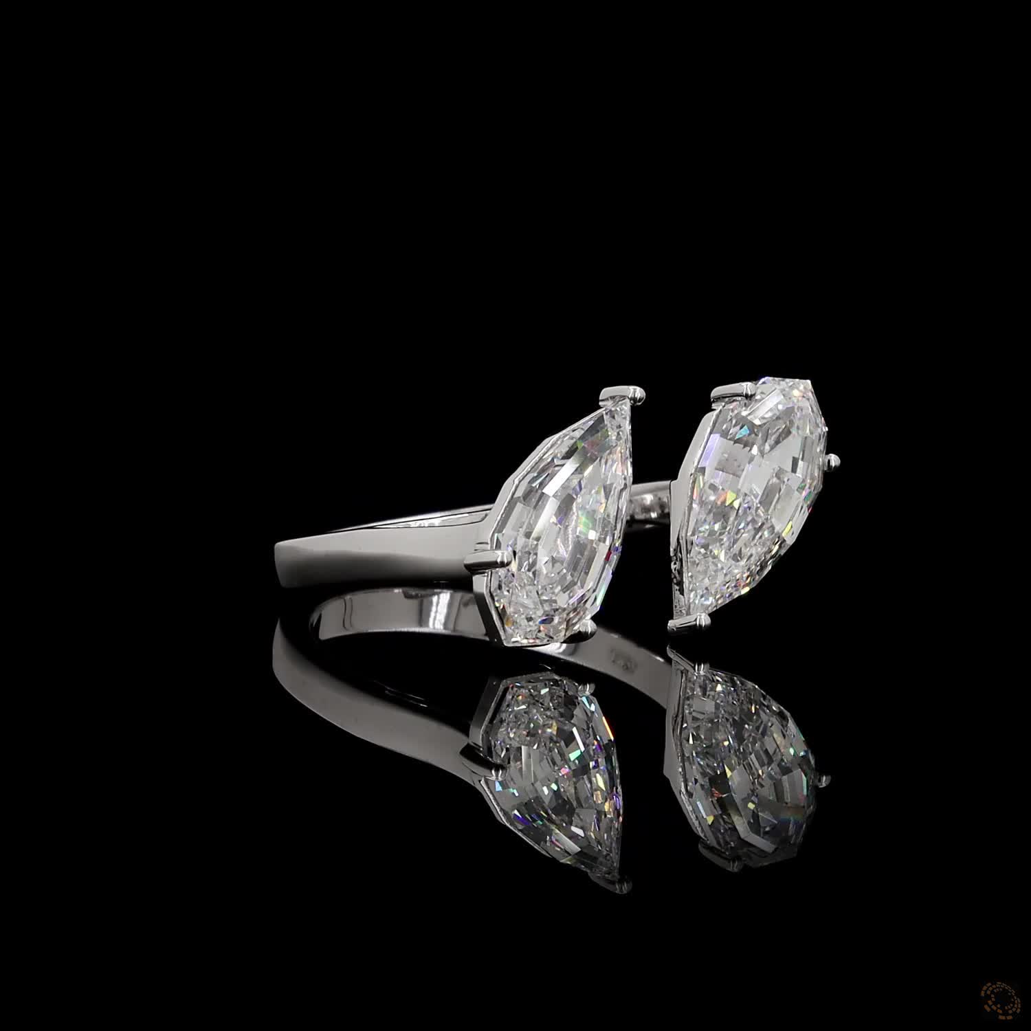 3.15 Ct Open cuff band with individually set basket prongs and protective V-prongs on the tips