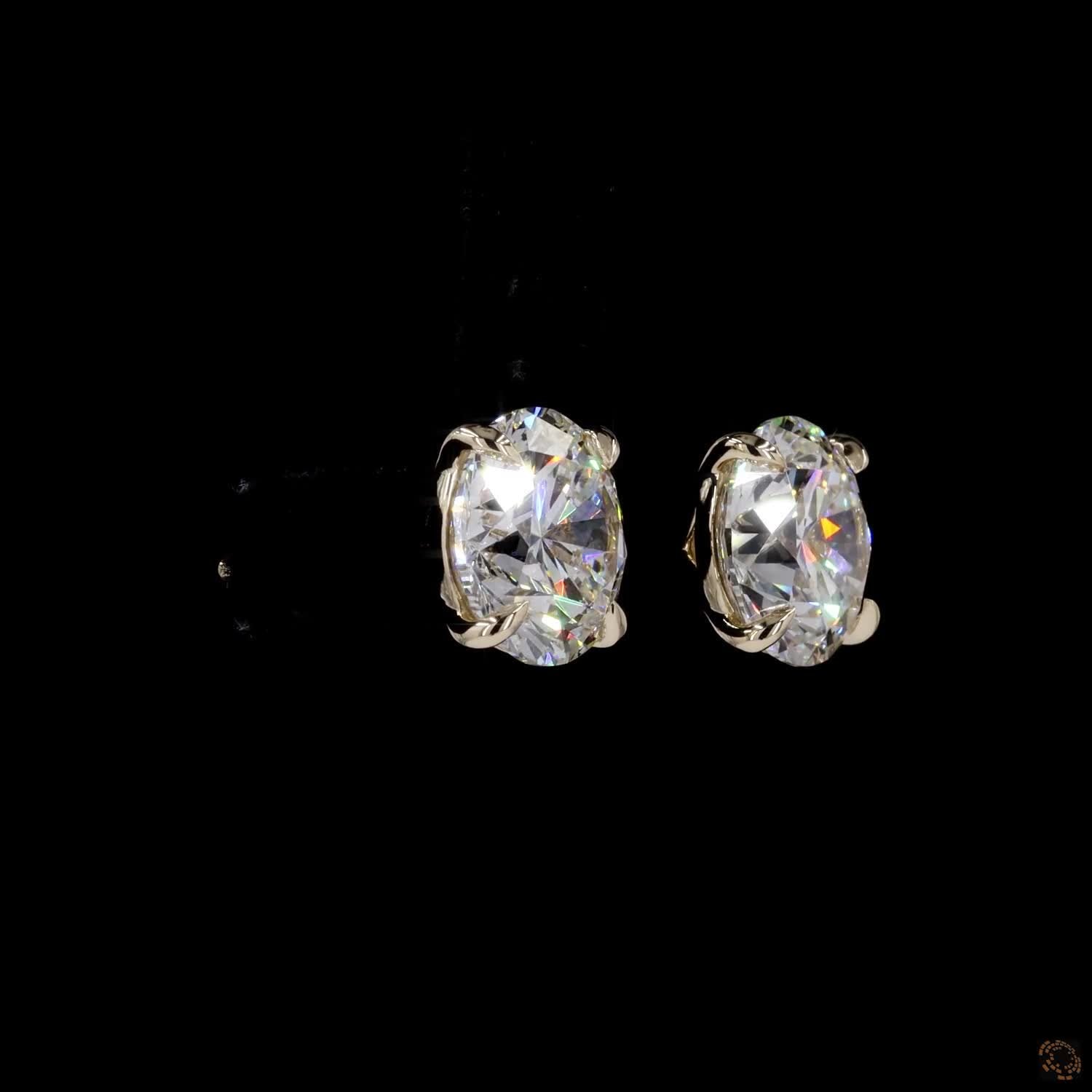 7.87 Ct Classic four-prong setting with refined claw prongs holding each gemstone securely at the corners to maximize light entry and brilliance