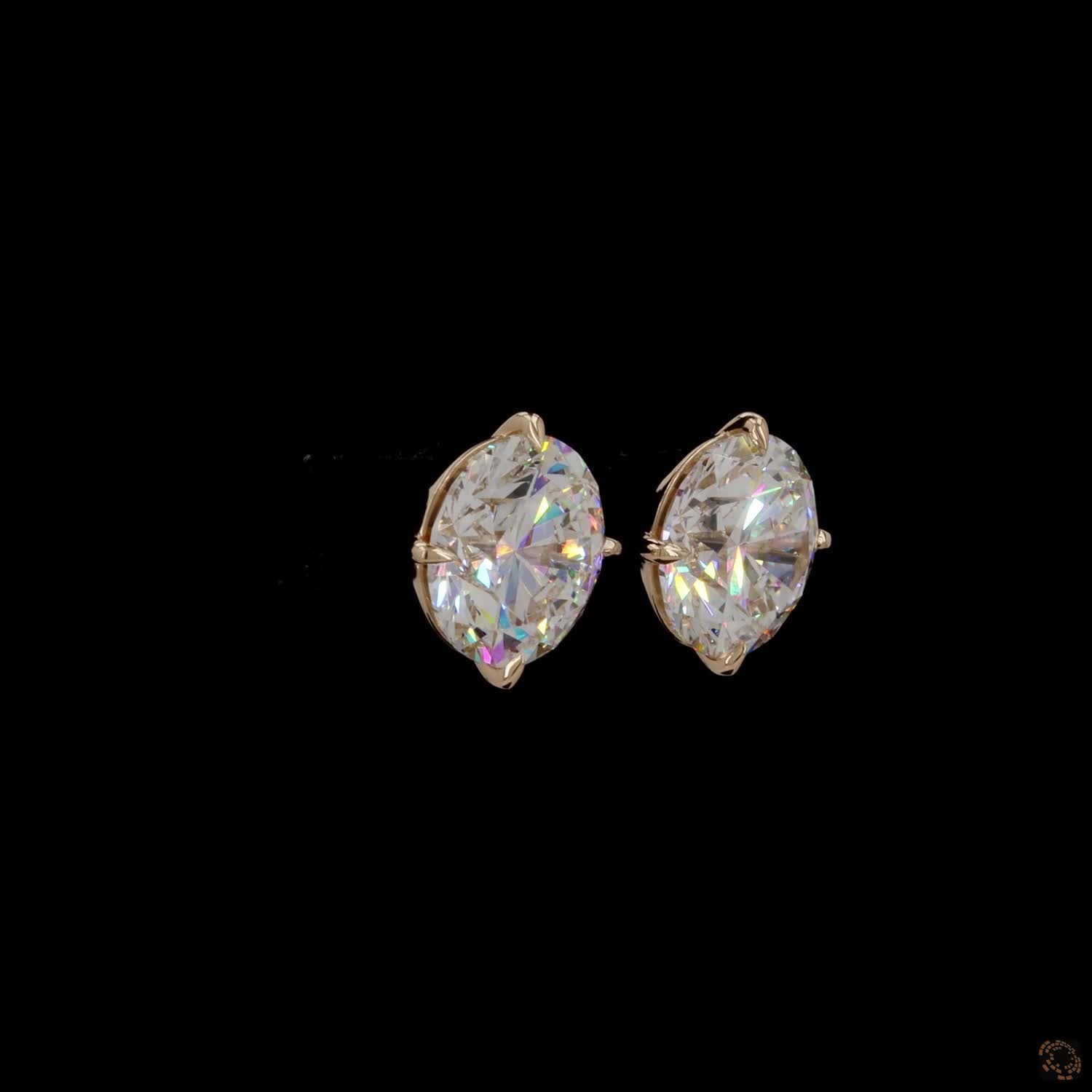 12.14 Ct High-clarity Round Brilliant Cut diamonds showing intense fire and brilliance