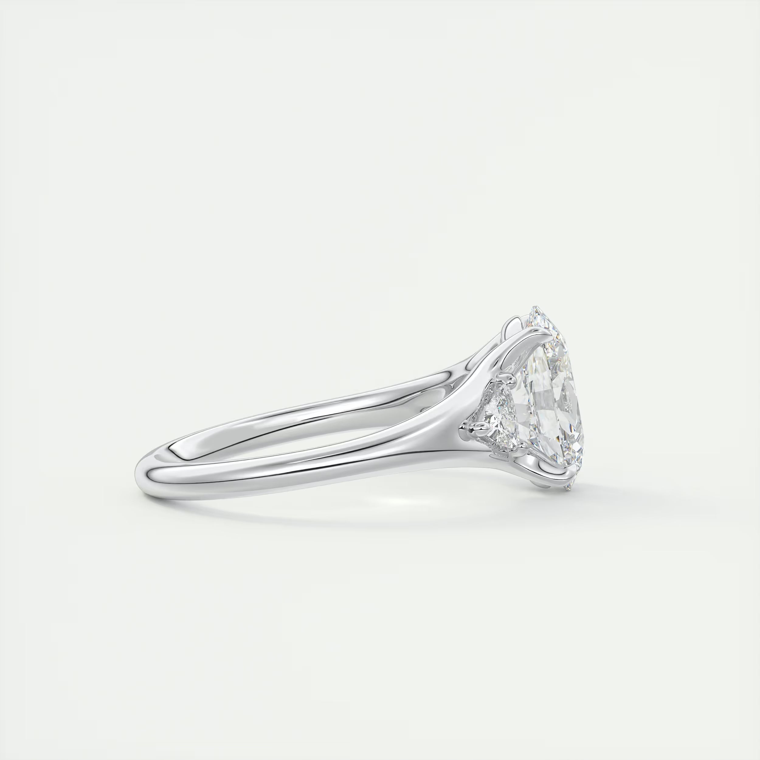 2.30 Ct The Center Stone Oval & Side Stone Trilliant Split Shank Three Stone Engagement Rings