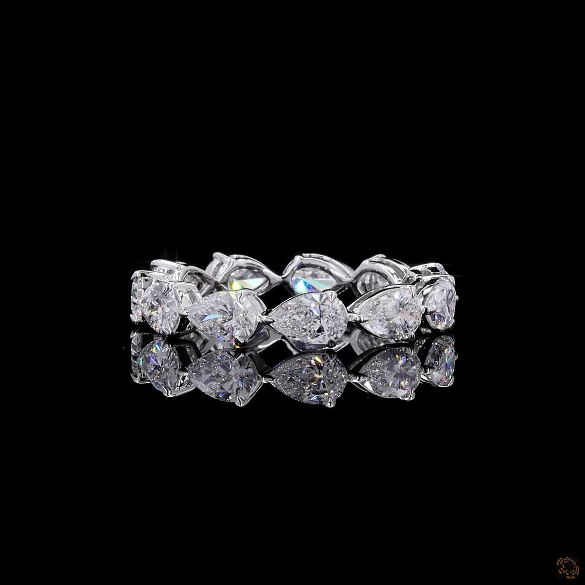 2.72 Ct Full eternity band featuring horizontally set East-West style pear-cut diamonds
