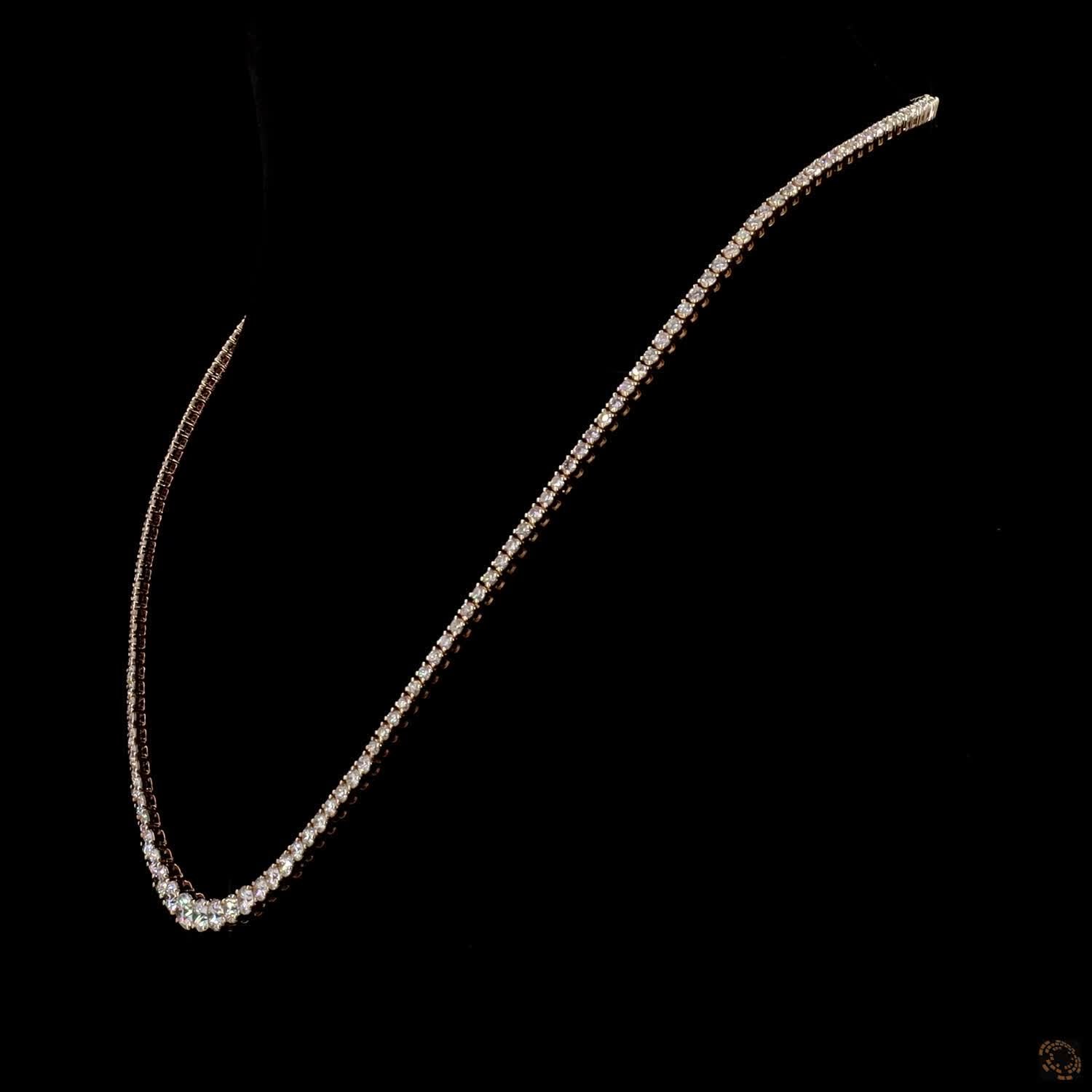 9.7 Ct Riviera-style tennis necklace featuring a smooth, symmetrical graduation of round brilliant diamonds leading to a central focal point