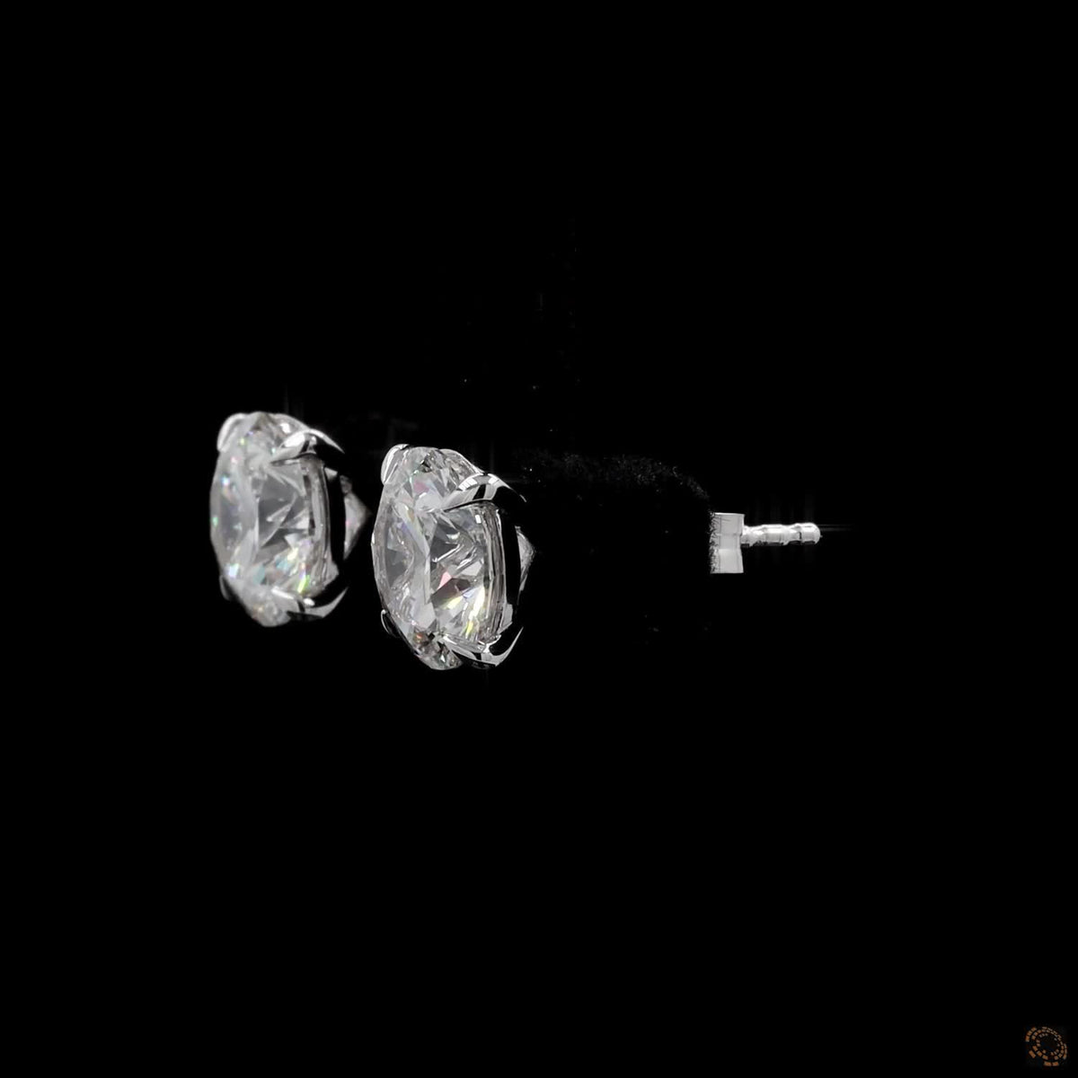 4.18 Ct Embrace quintessential elegance with these classic round brilliant-cut diamond solitaire stud earrings set in 14K white gold