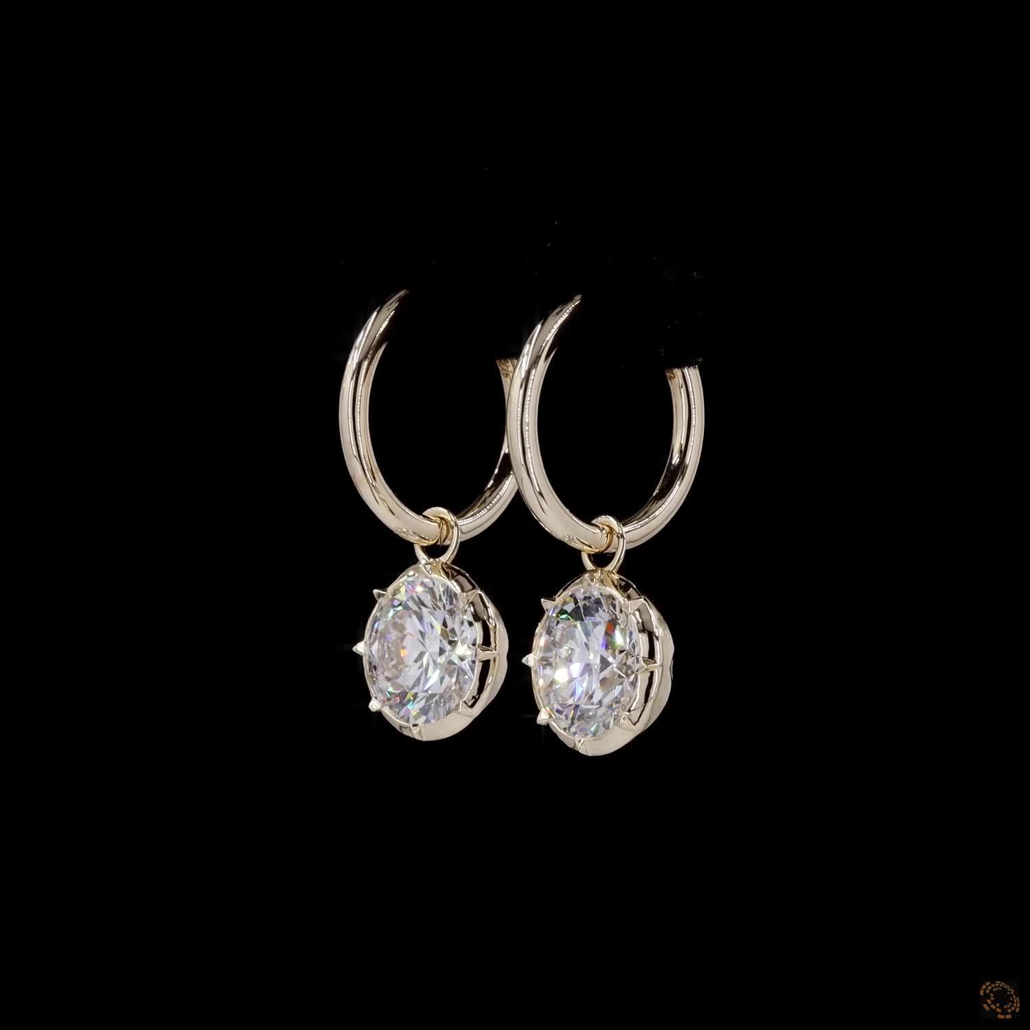 6.07 ct The full 14K yellow gold bezel frame warms the overall look, creating a rich aesthetic that elevates everyday diamond hoop stacks