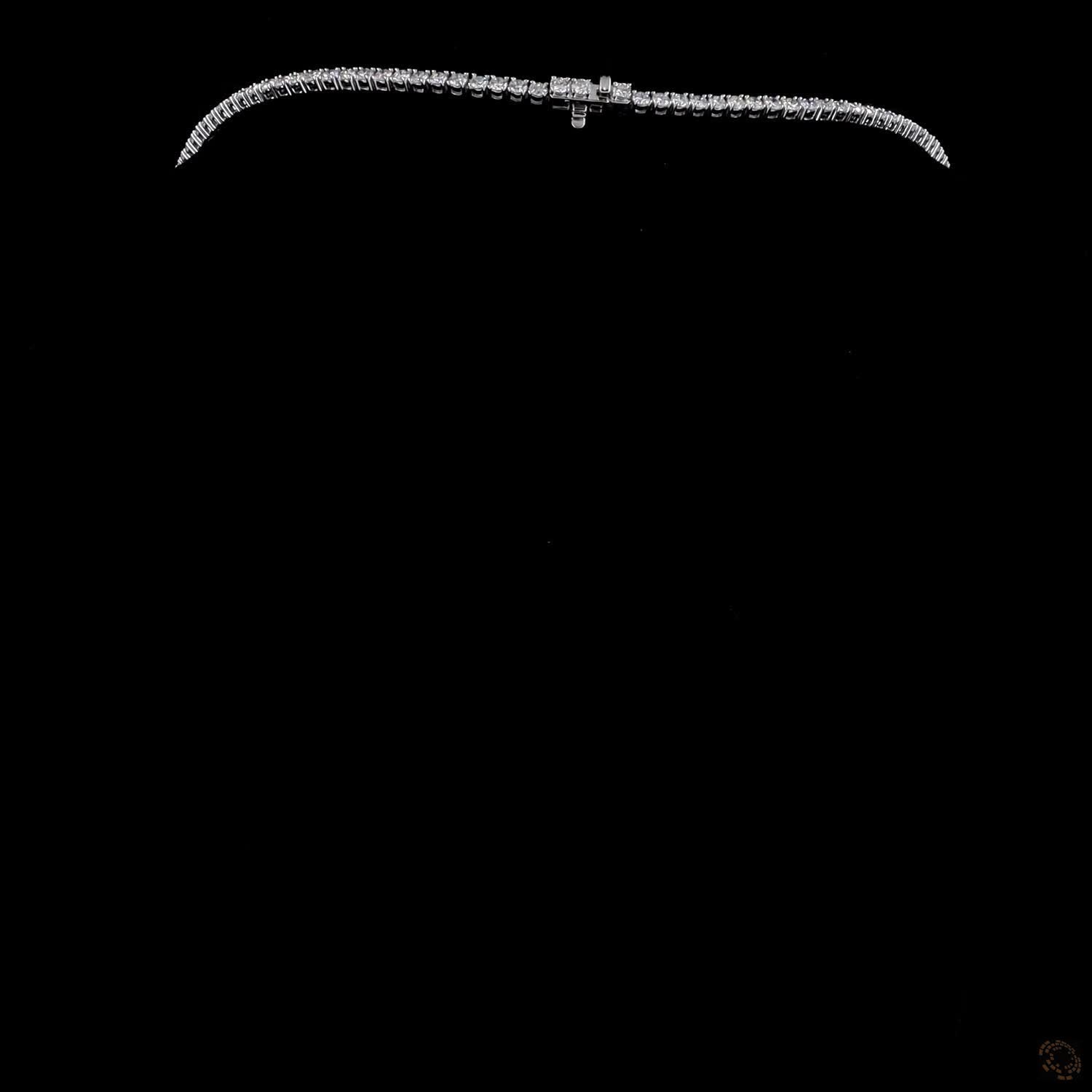 29.02 Ct Round Brilliant Cut diamonds seamlessly graduated from prominent center stones down to smaller accent stones toward the clasp