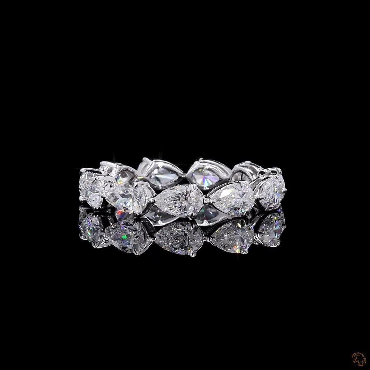 2.72 Ct Full eternity band featuring horizontally set East-West style pear-cut diamonds