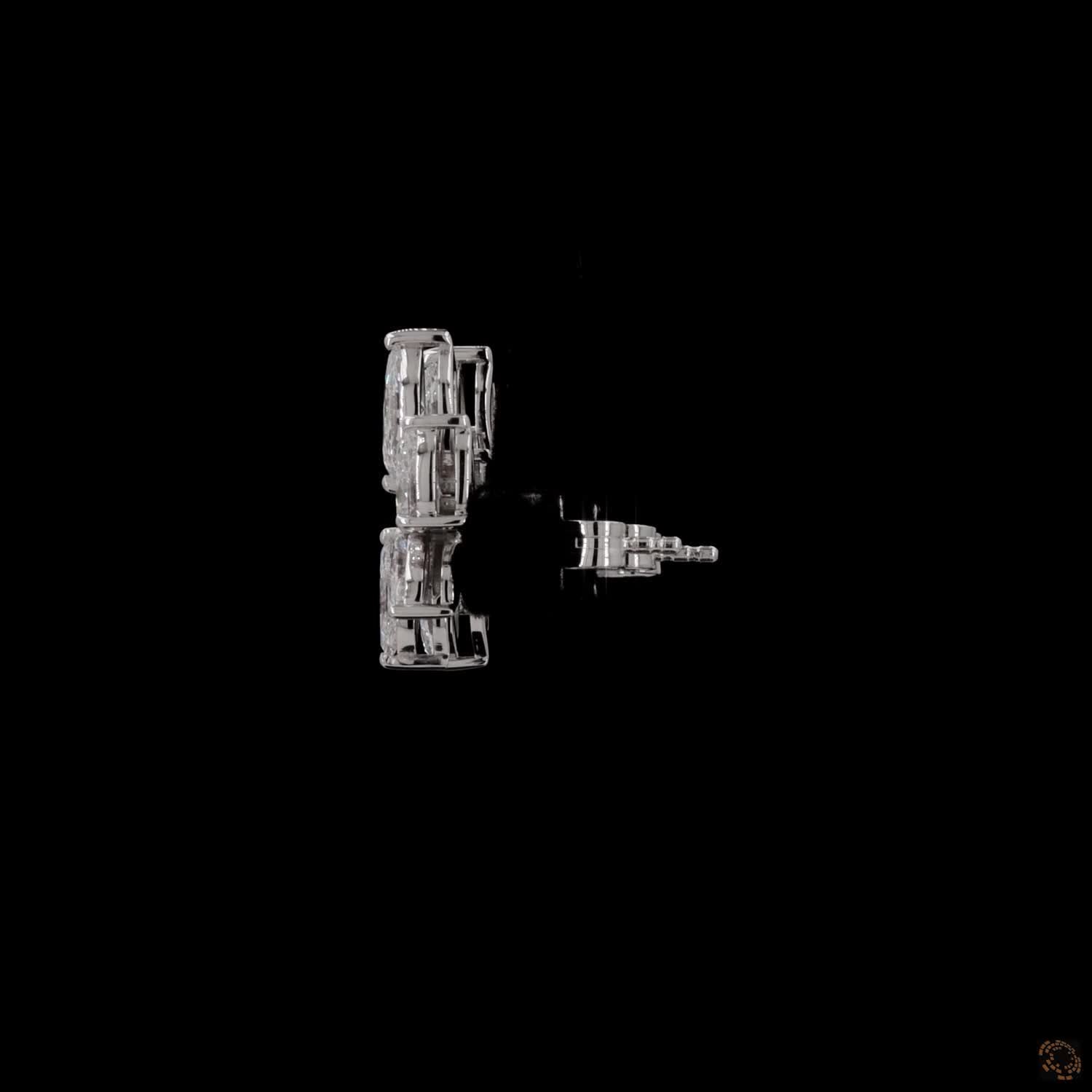 2.85 Ct High-brilliance marquise and pear cut diamonds set in shared-prong mountings