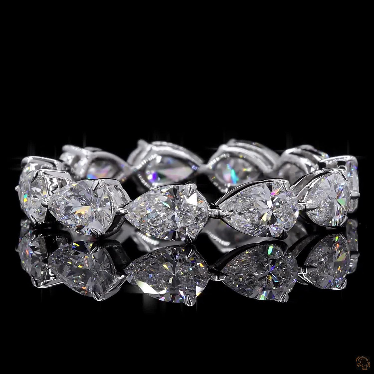 2.72 Ct Full eternity band featuring horizontally set East-West style pear-cut diamonds