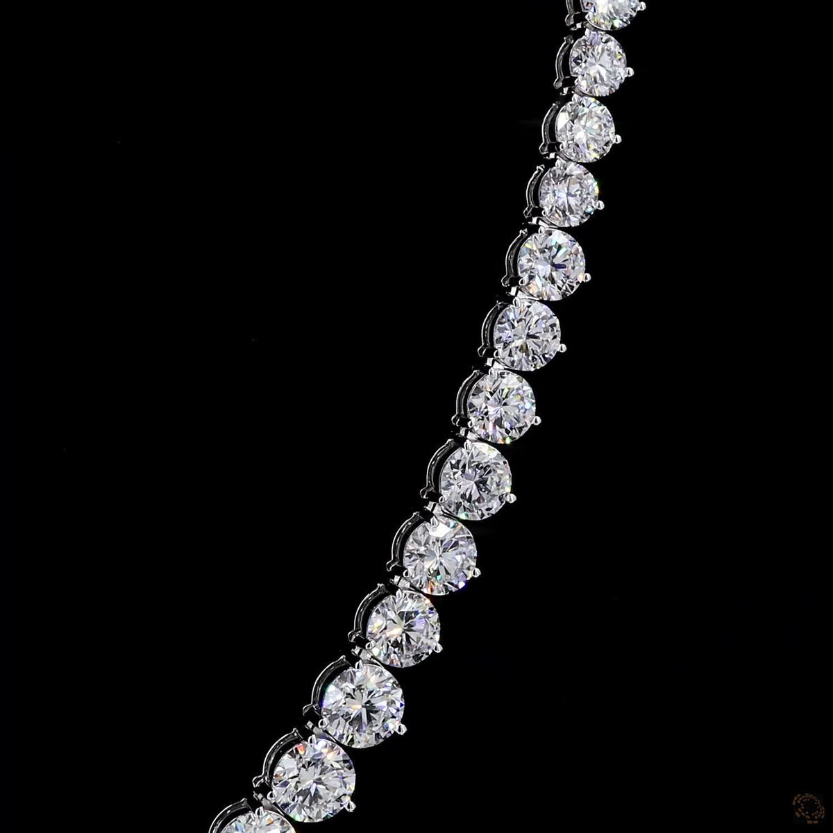 38.58 Ct Experience sleek, dynamic luxury with this bezel-set graduated round-cut diamond tennis necklace