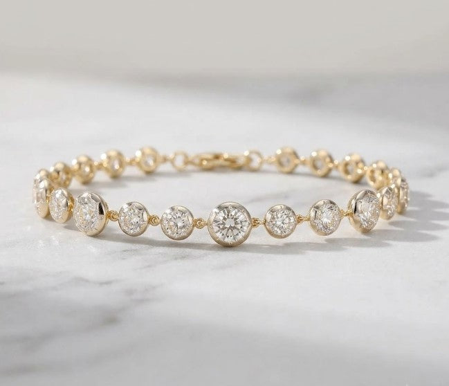9.32 Ct Graduated Bezel Set Lab Grown Diamond Tennis Bracelet in Yellow Gold