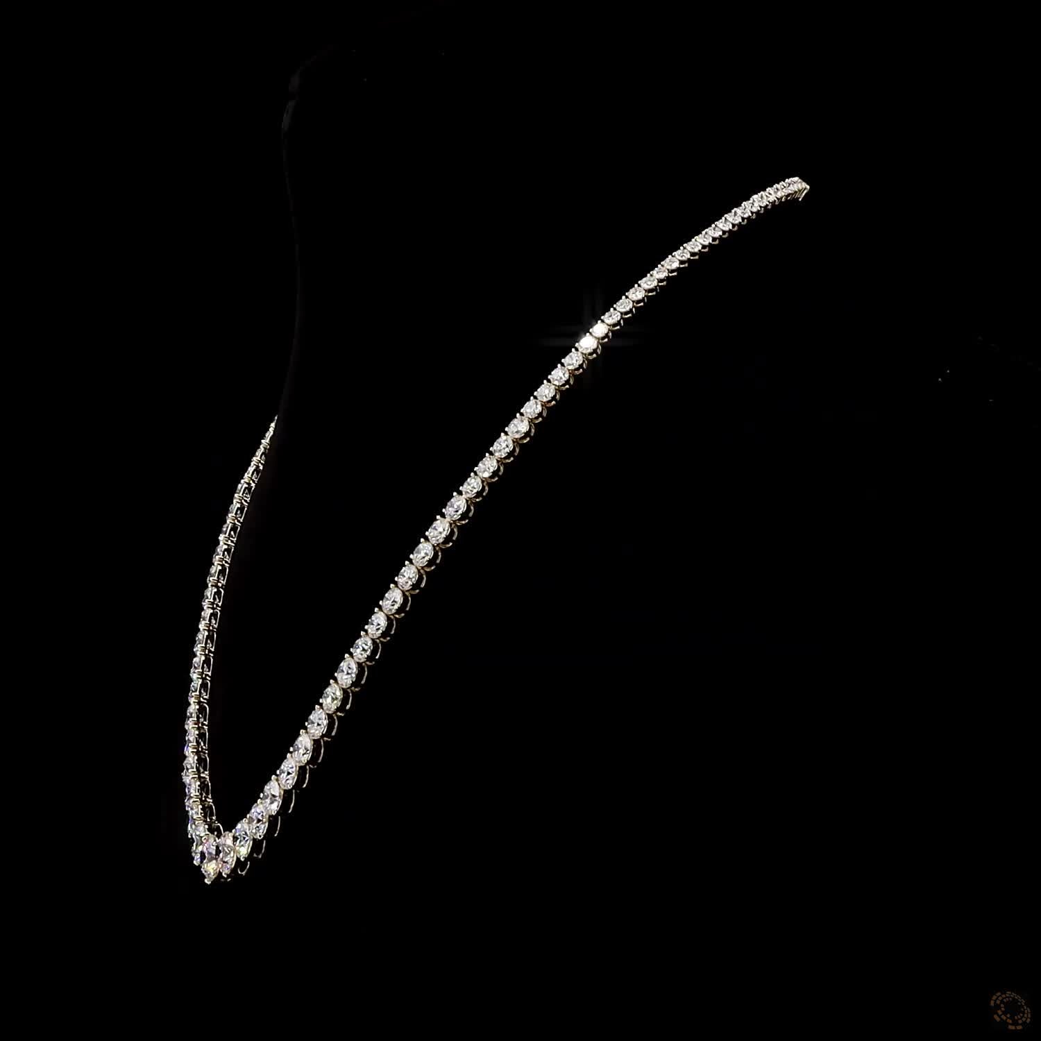 17.79 Ct Round Brilliant Cut diamonds arranged in a dramatic graduated layout tapering toward the back