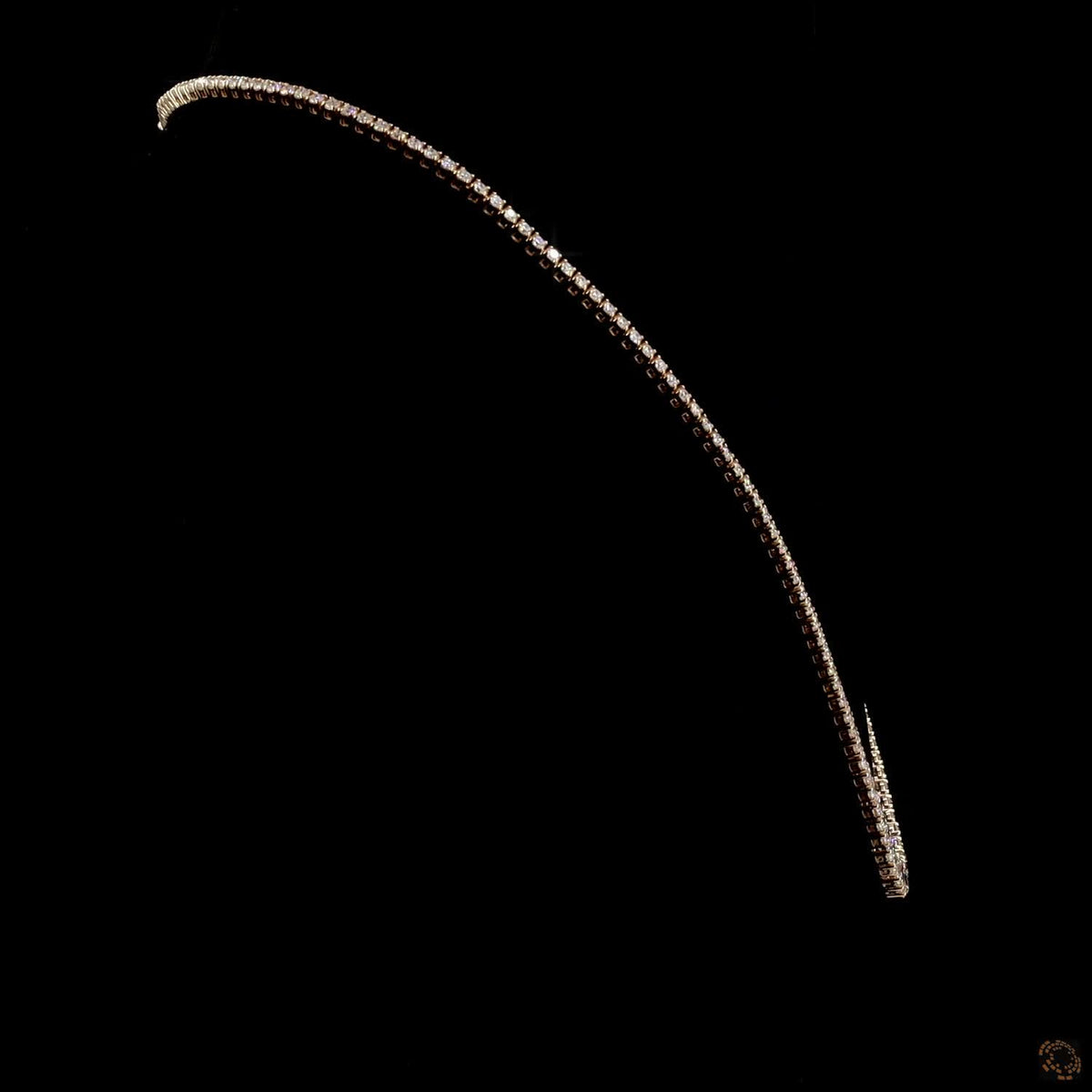 9.7 Ct Riviera-style tennis necklace featuring a smooth, symmetrical graduation of round brilliant diamonds