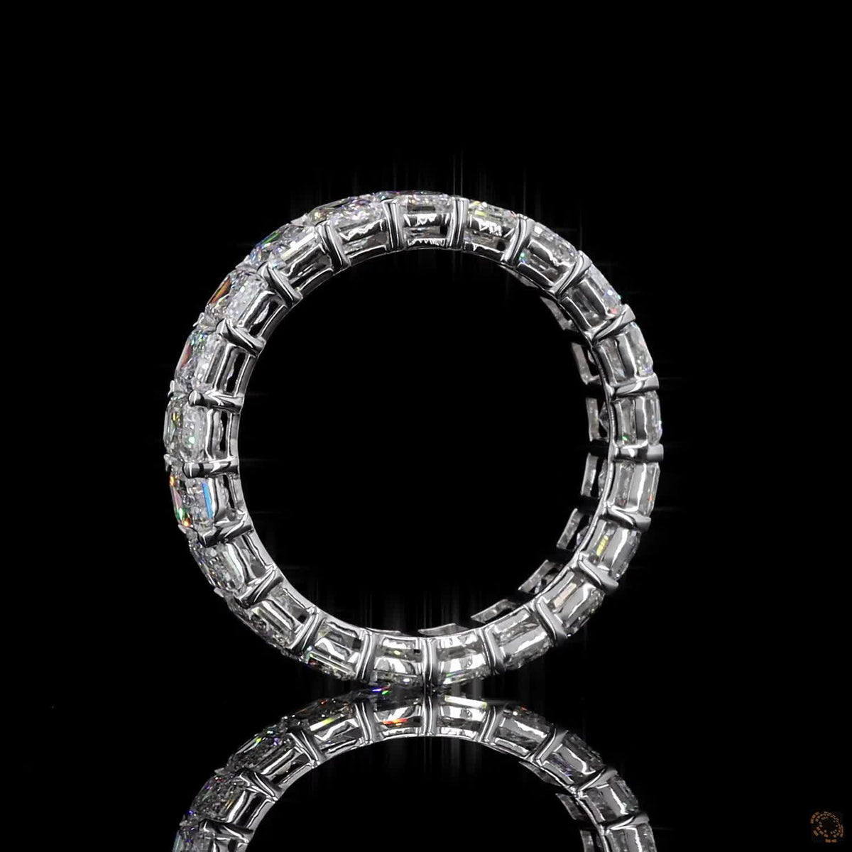 5.39 Ct Step-cut Emerald Diamonds continuously set around the full band