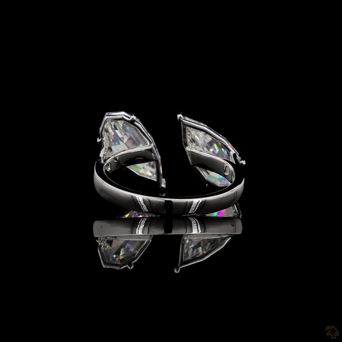 3.15 Ct Open cuff band with individually set basket prongs and protective V-prongs on the tips