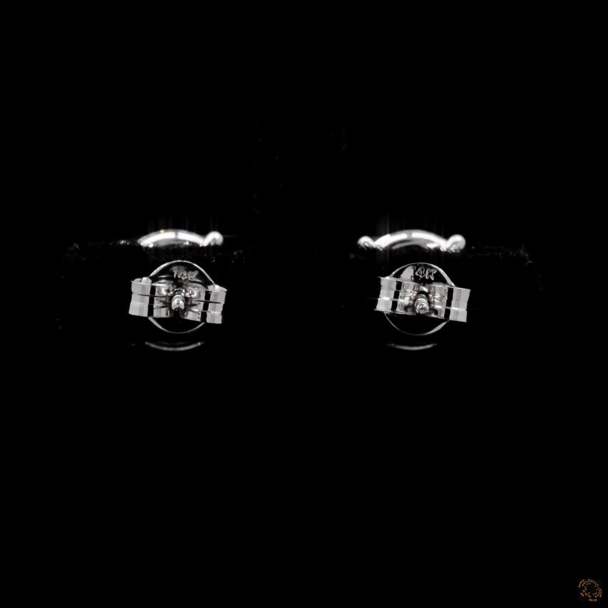 4.18 Ct Embrace quintessential elegance with these classic round brilliant-cut diamond solitaire stud earrings set in 14K white gold